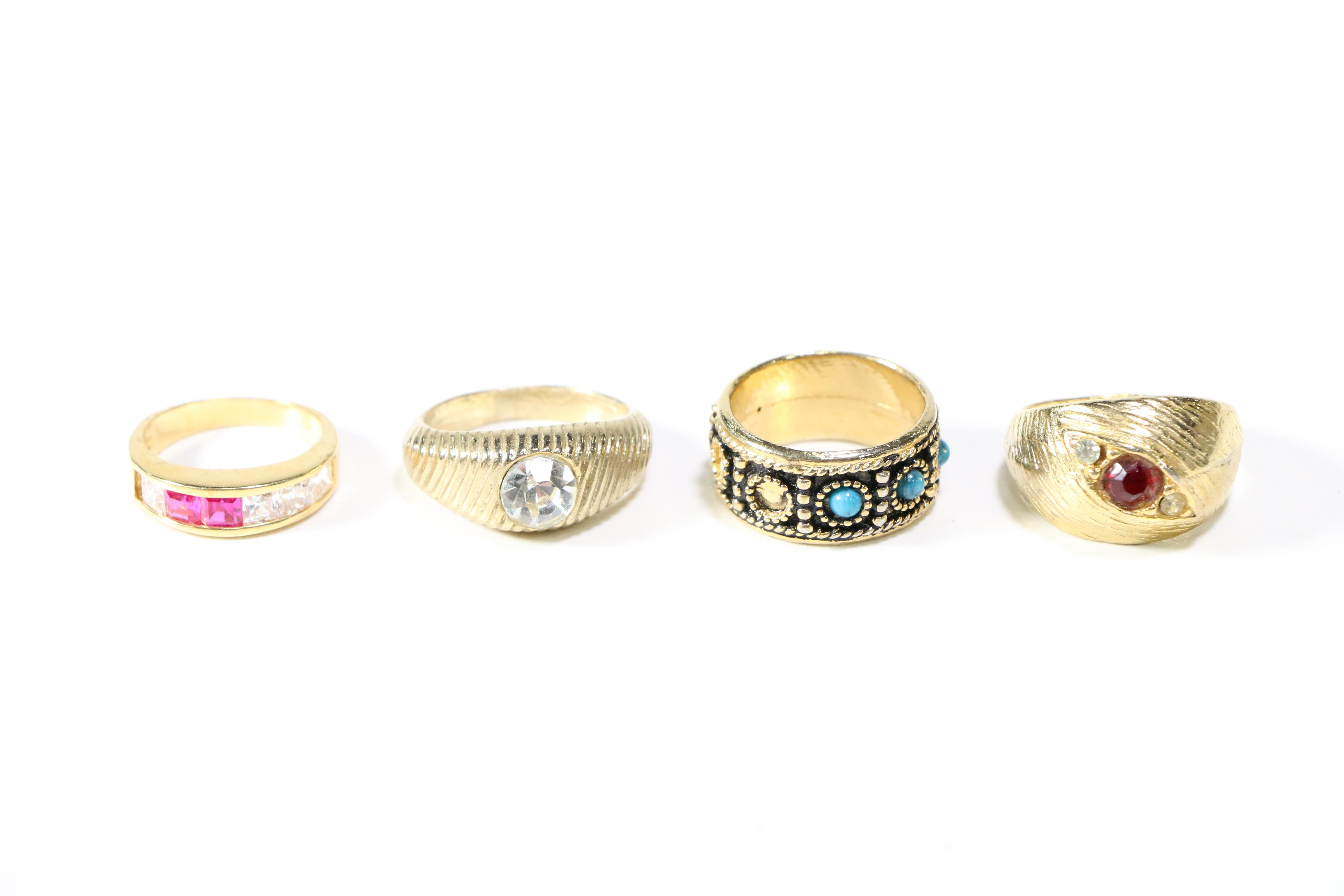 Assorted Gold Tone Rings and Brooches