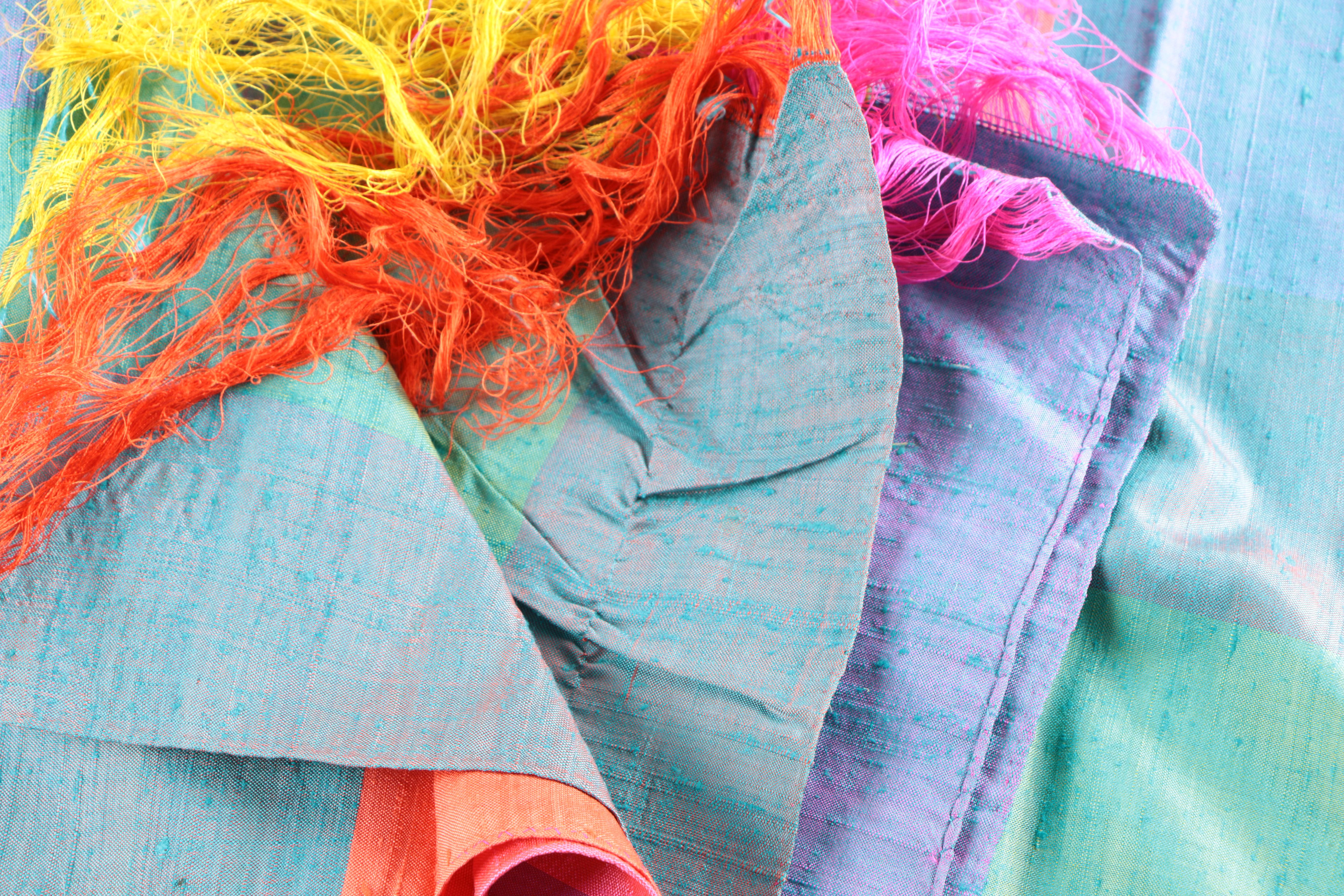 Colorful Scarves Including Fringe