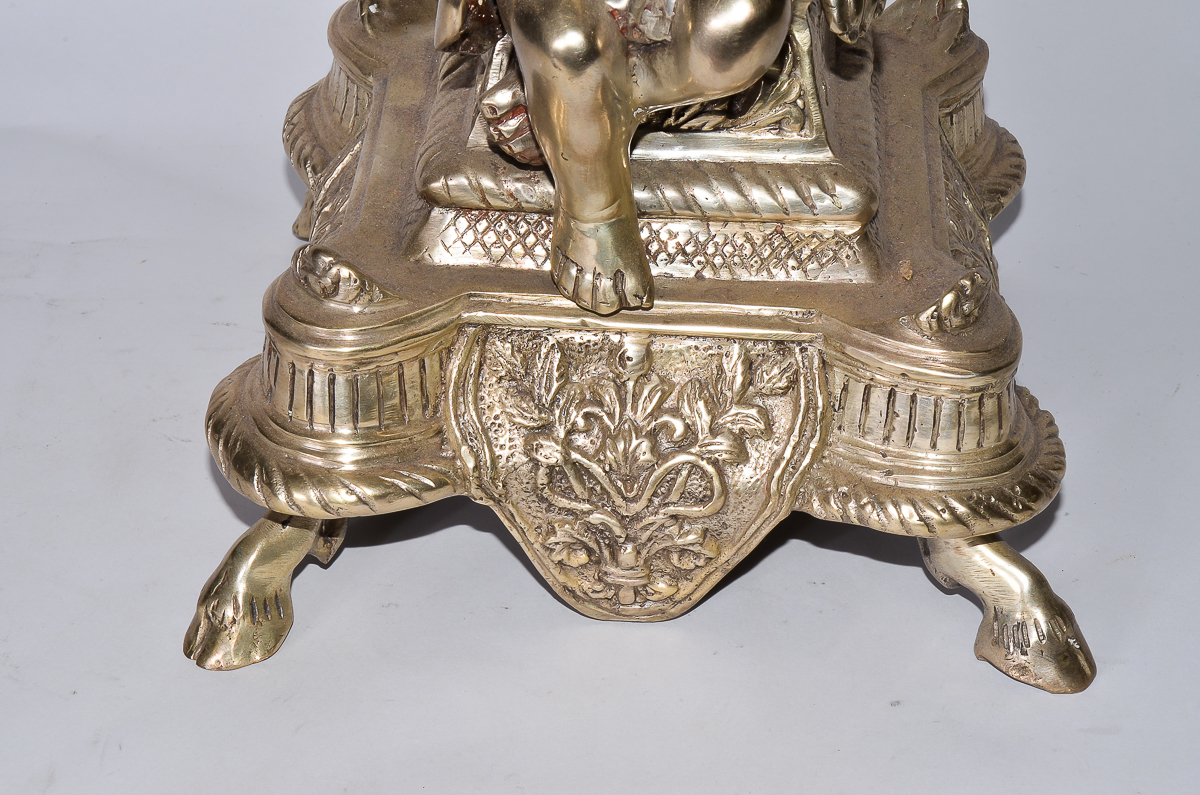 Pair of Silver Plated Candelabras with Cherubs