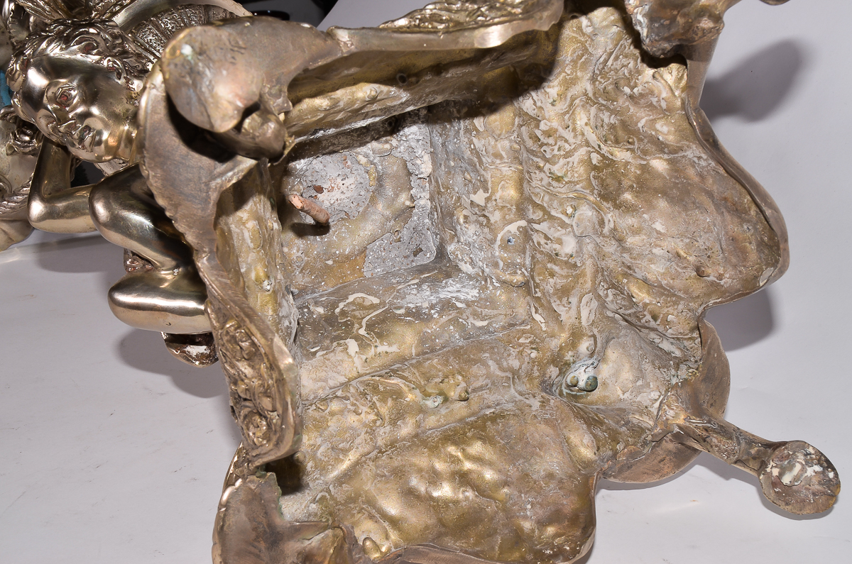 Pair of Silver Plated Candelabras with Cherubs