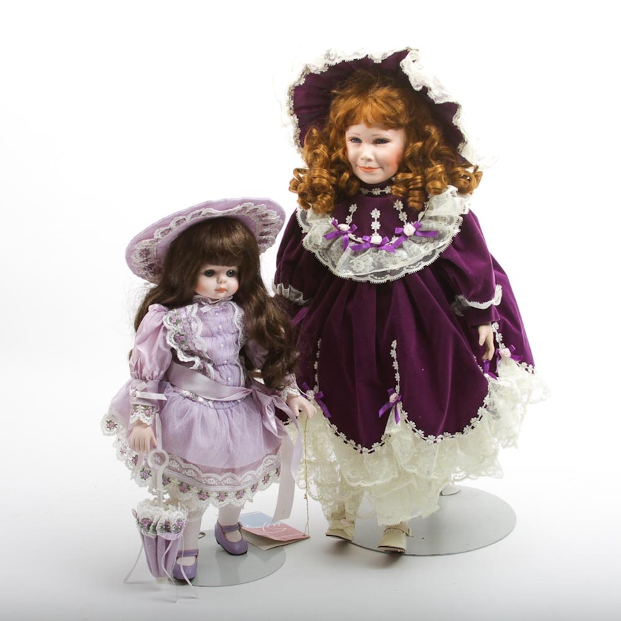 Pair of Cloth Body Porcelain Dolls