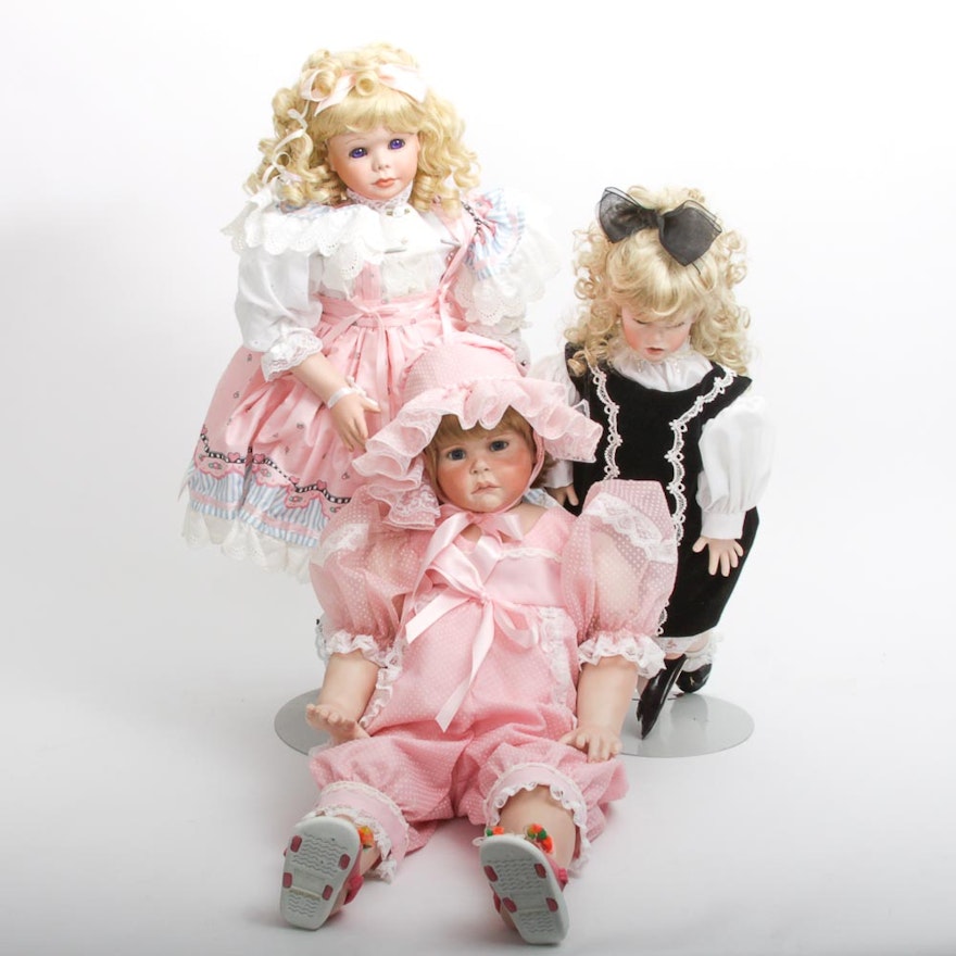 Three Porcelain Dolls