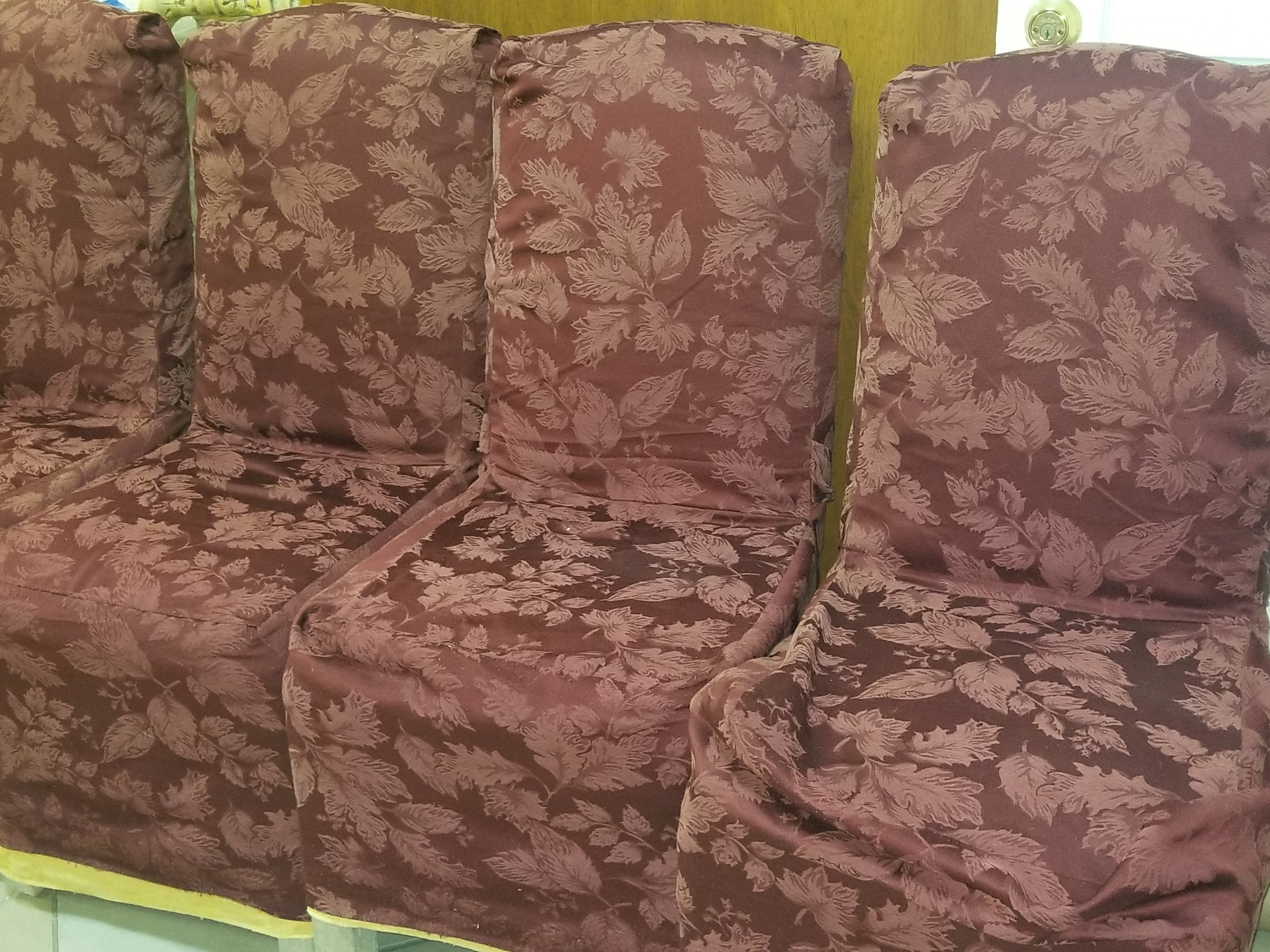 Set of Four Chairs with Burgundy Chair Covers