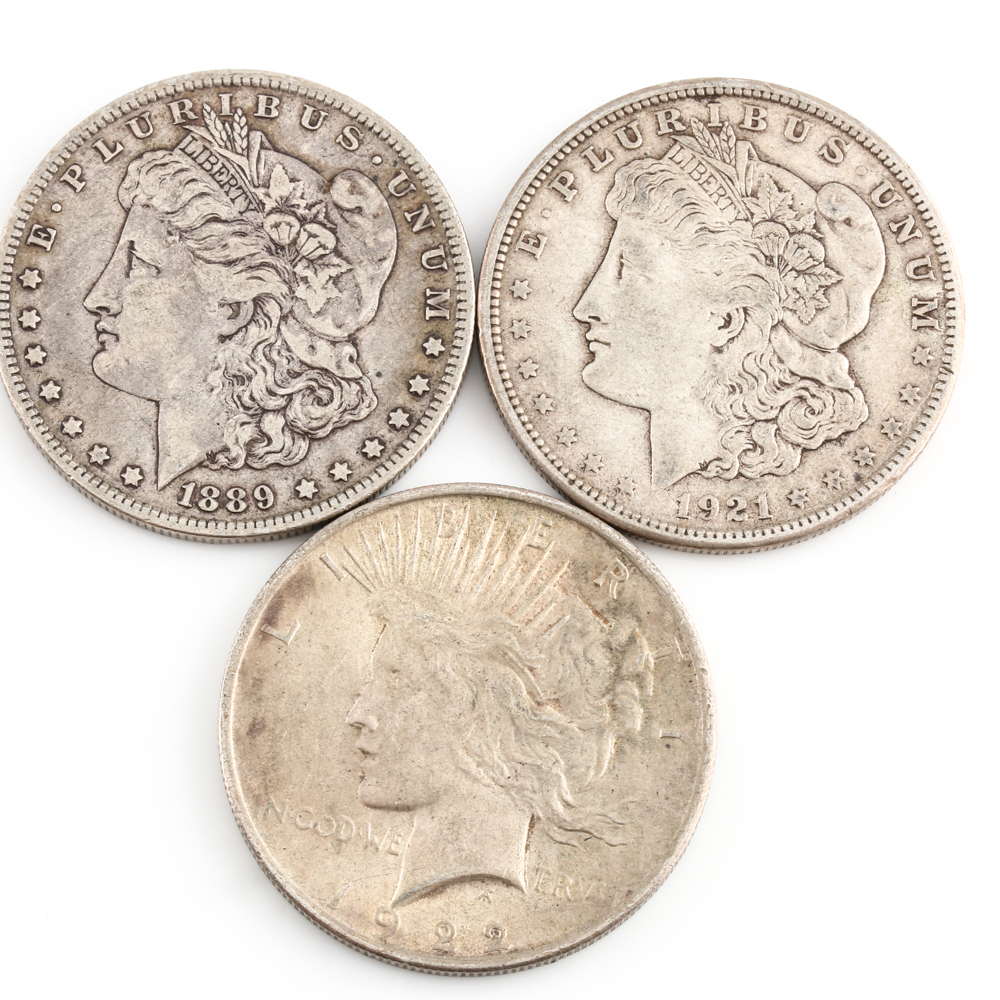 Two Morgan Silver Dollars and a Peace Silver Dollar