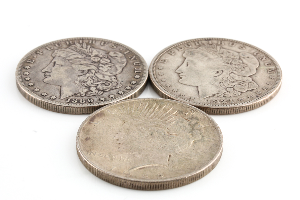 Two Morgan Silver Dollars and a Peace Silver Dollar