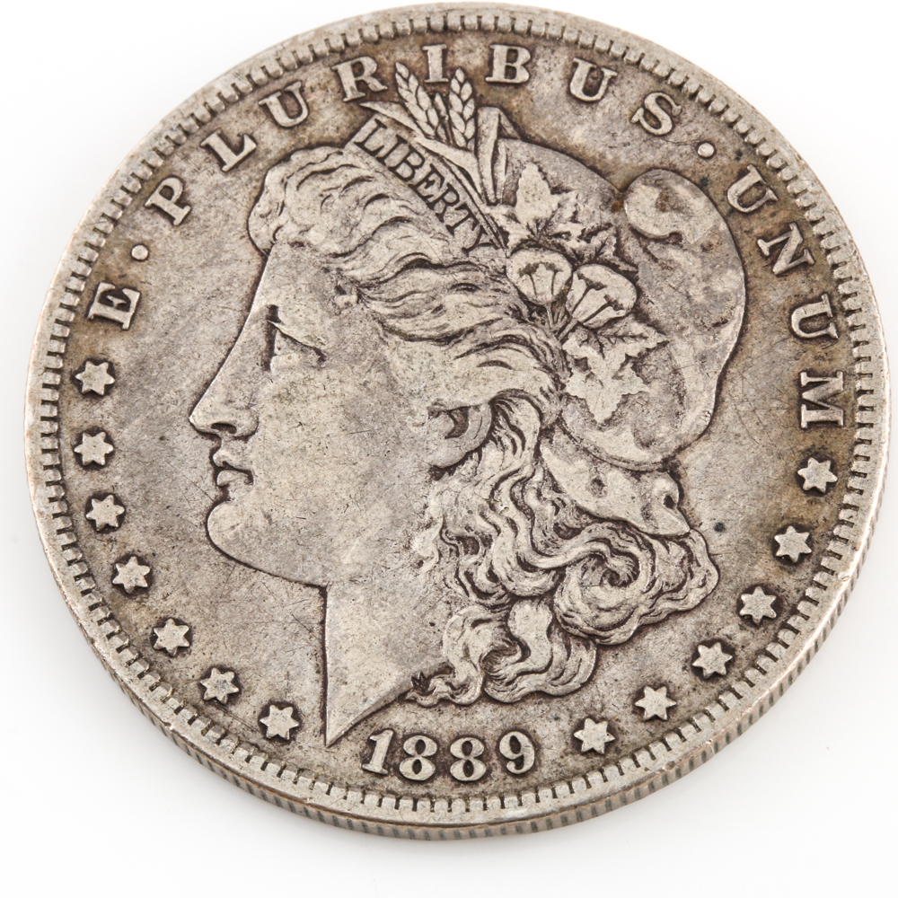 Two Morgan Silver Dollars and a Peace Silver Dollar