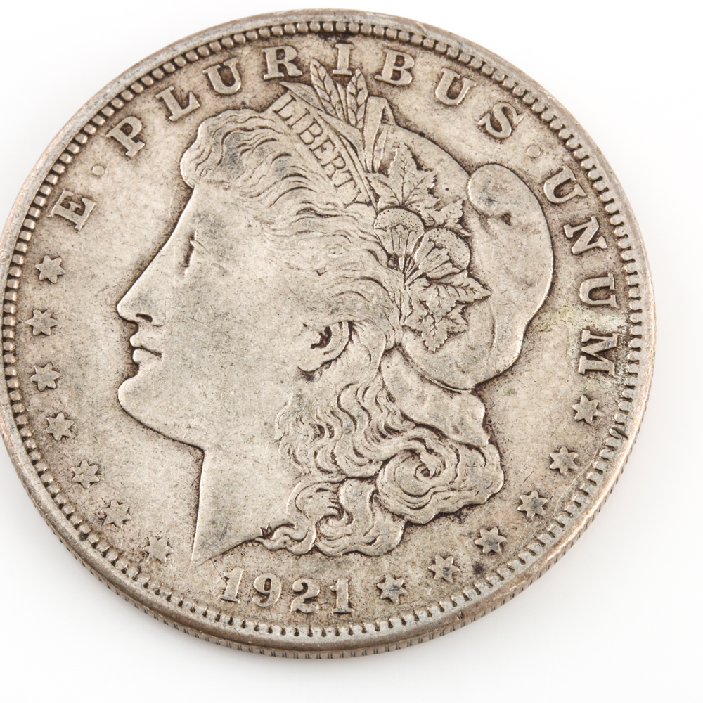 Two Morgan Silver Dollars and a Peace Silver Dollar