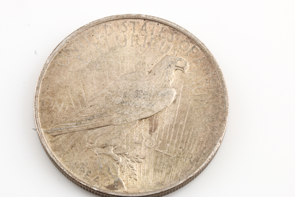 Two Morgan Silver Dollars and a Peace Silver Dollar