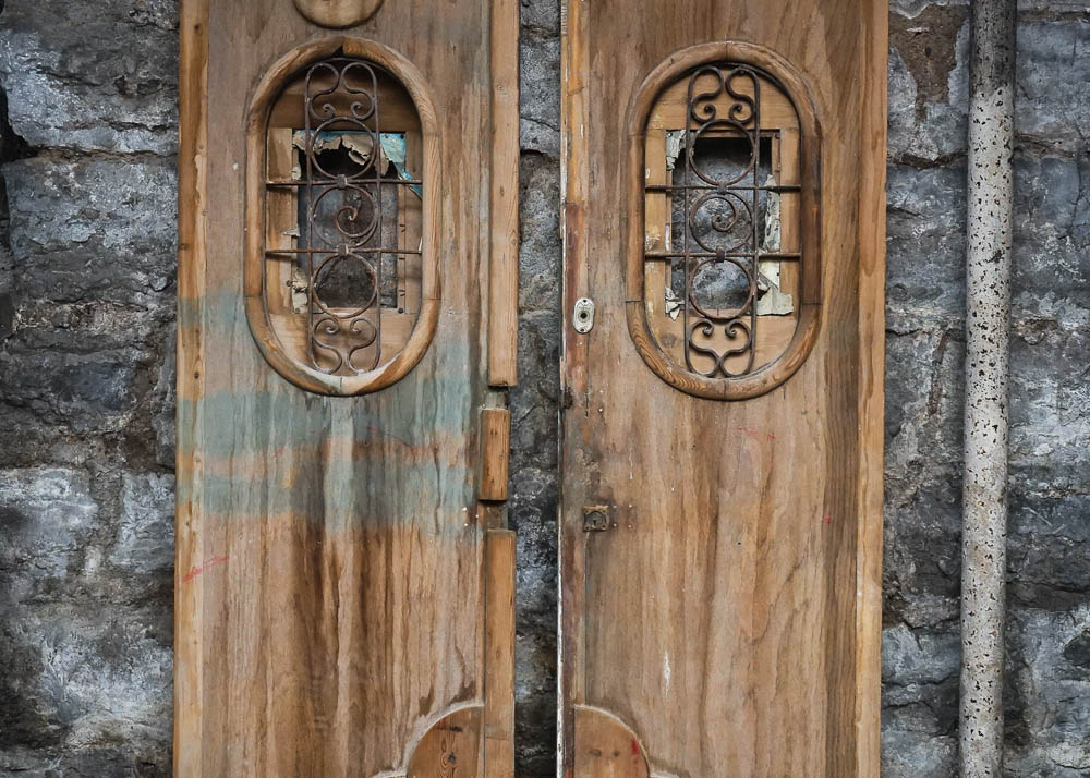 Egyptian-Style Doors With Decorative Iron Grates