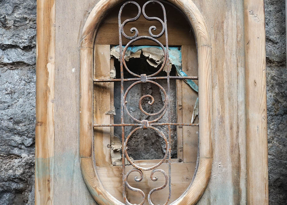 Egyptian-Style Doors With Decorative Iron Grates