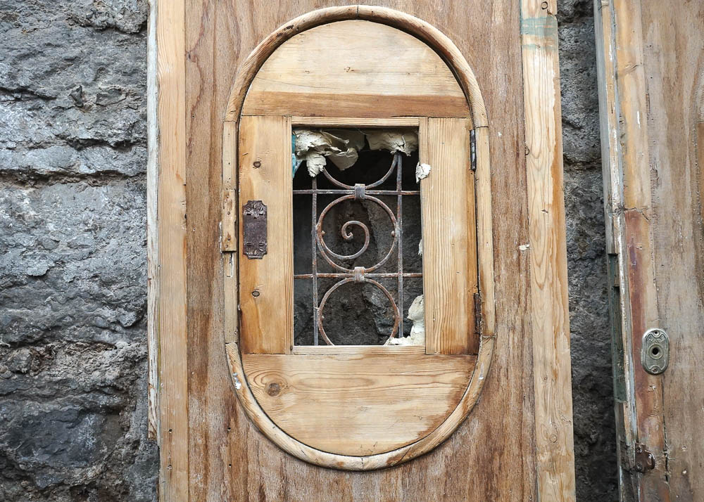 Egyptian-Style Doors With Decorative Iron Grates