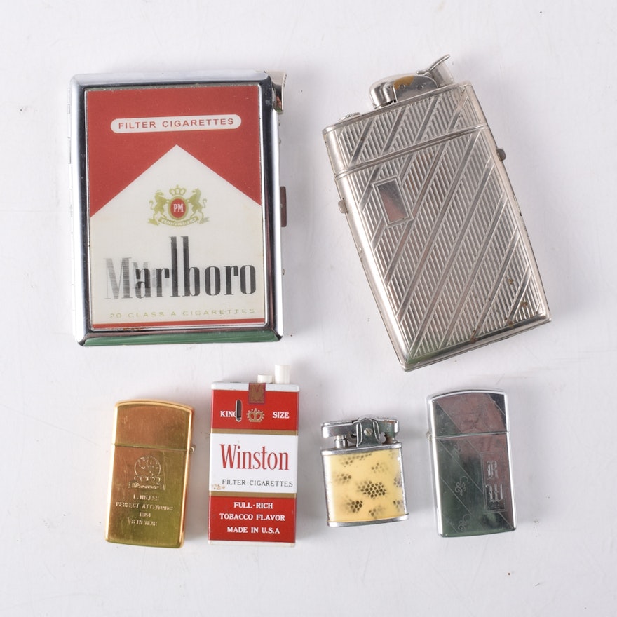 Assortment of Lighters and Cigarette Cases