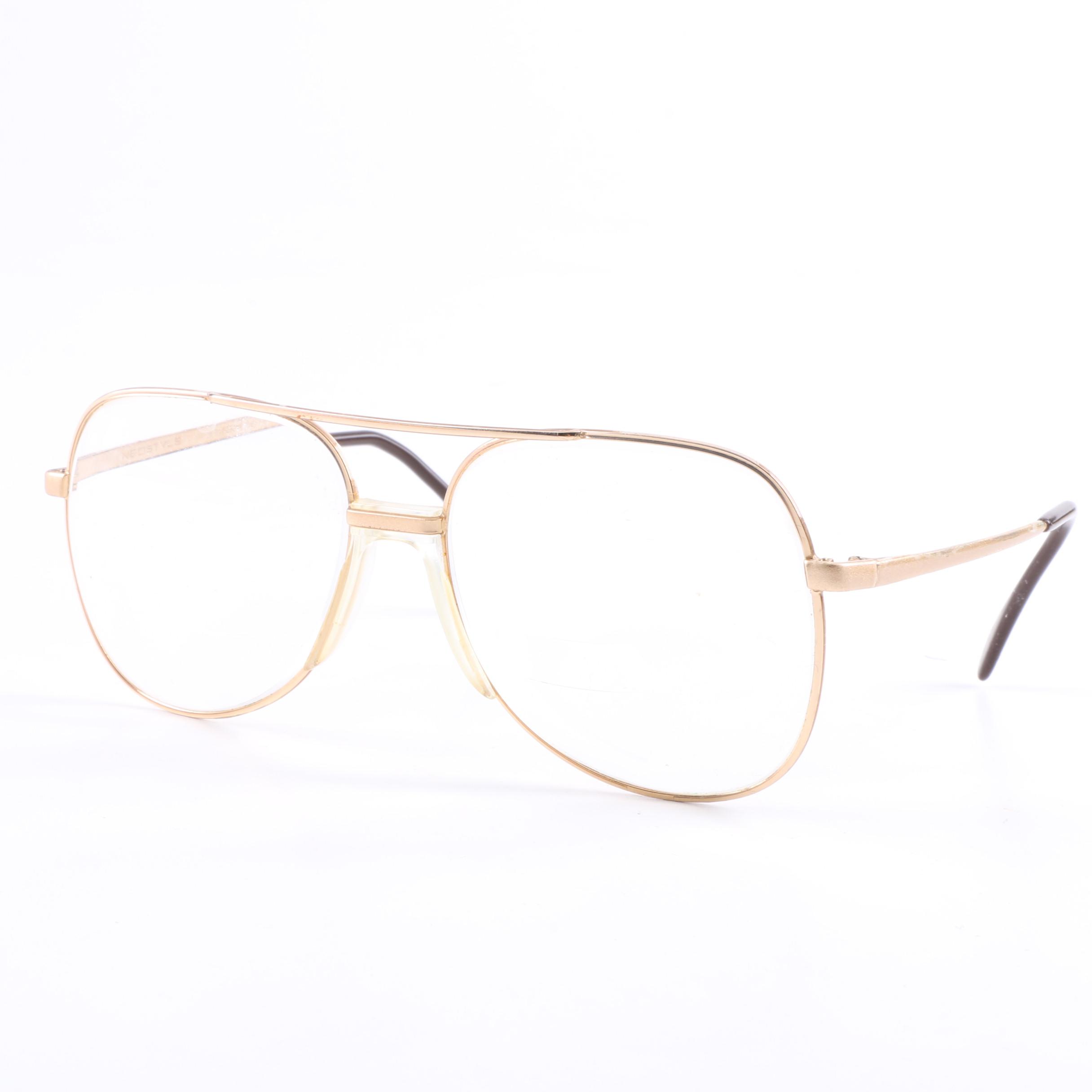 Dr. Robert Schullers Eyeglasses and Founding Pastor Medal