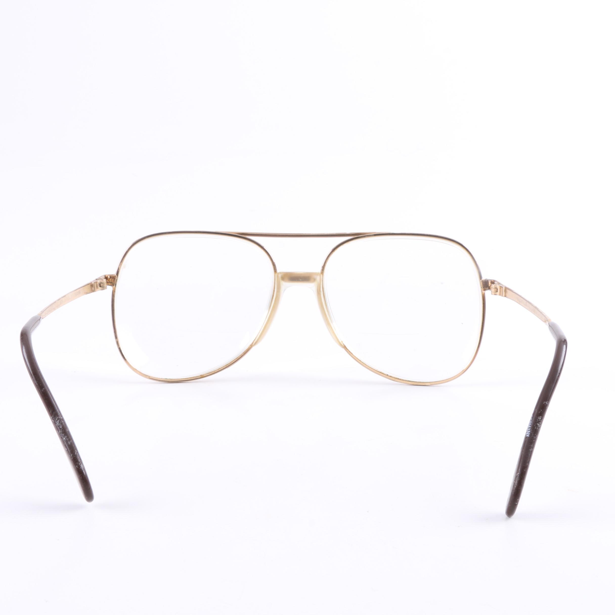 Dr. Robert Schullers Eyeglasses and Founding Pastor Medal