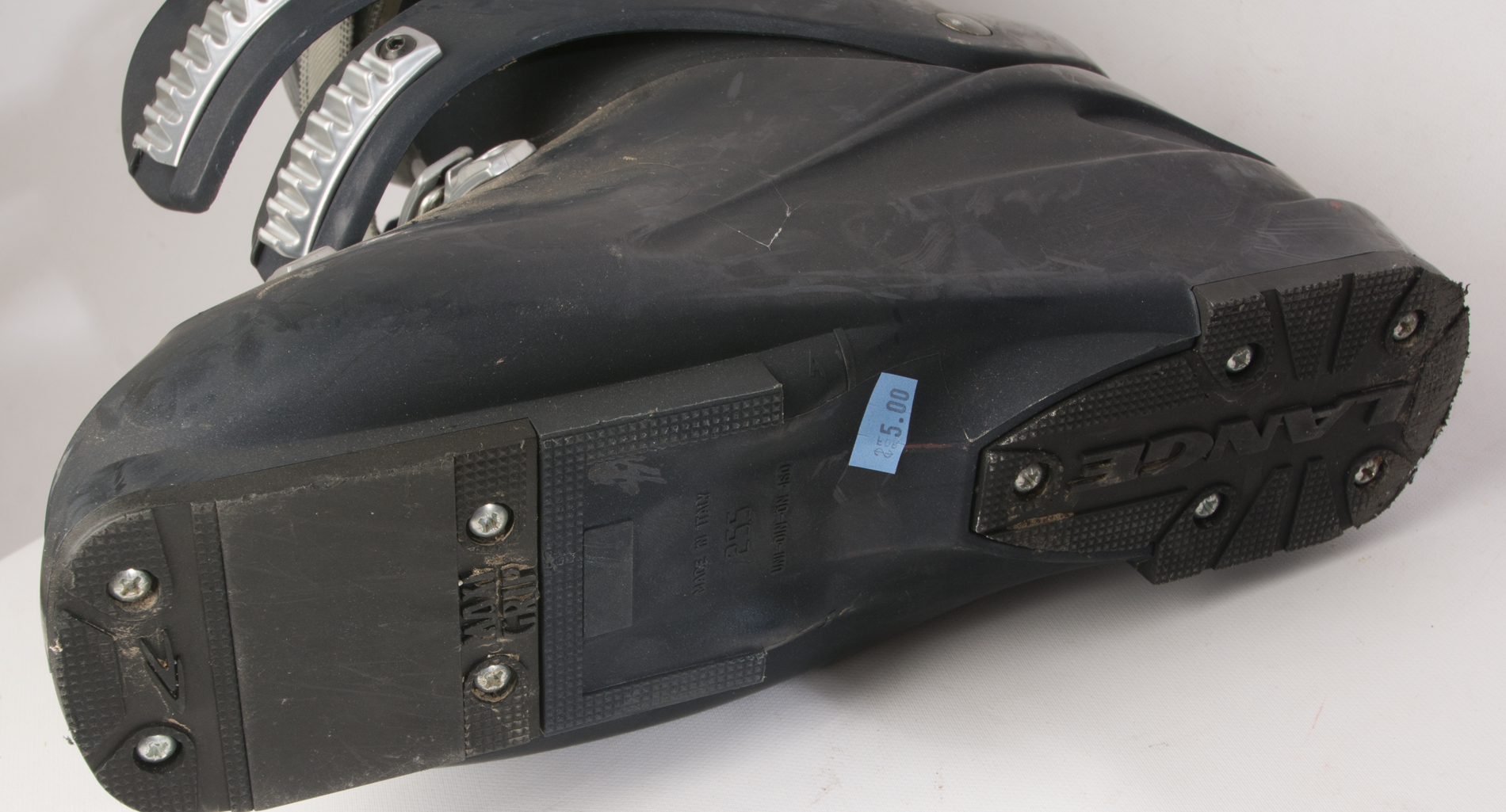 Three Pairs of Ski Boots featuring Rossignol