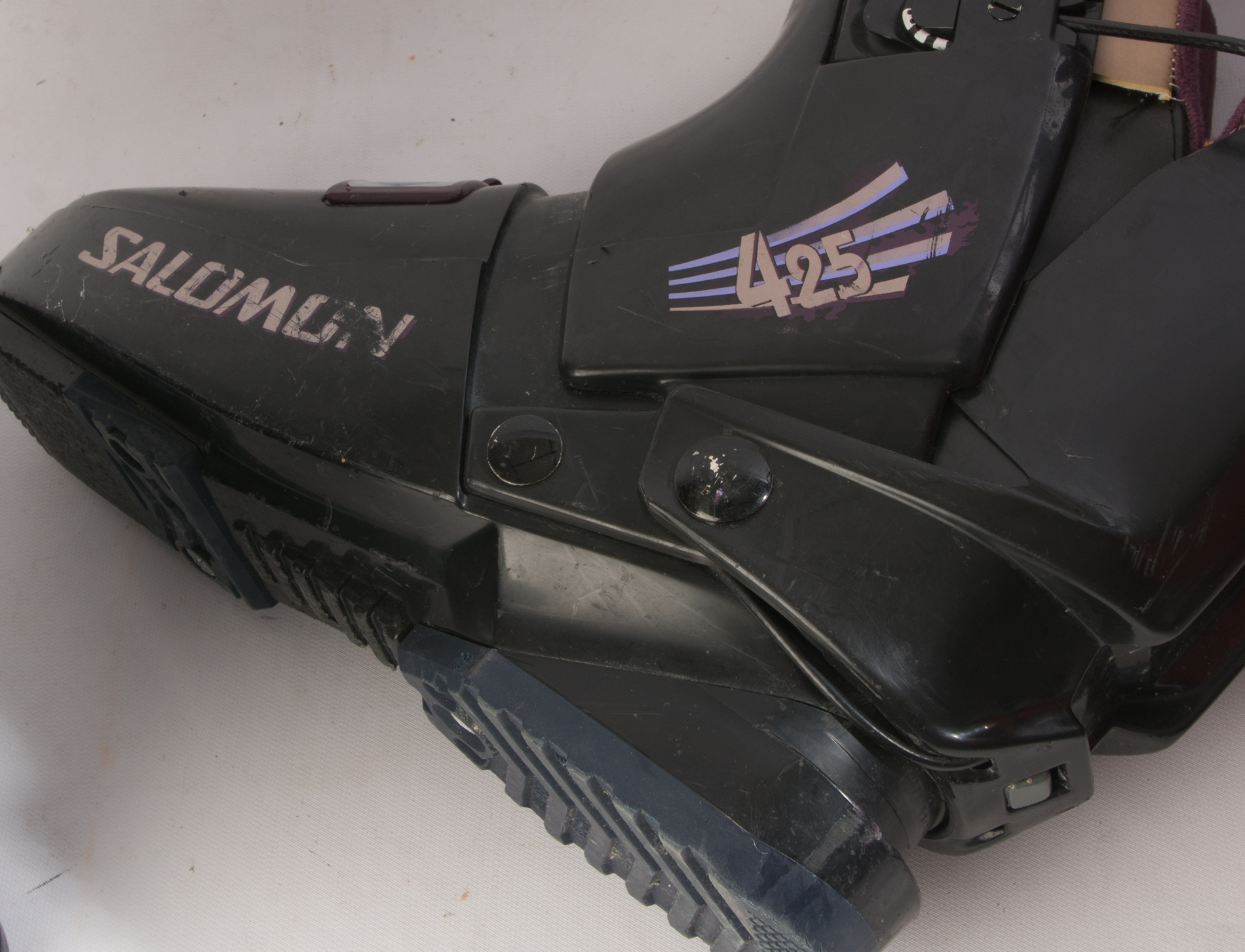 Three Pairs of Ski Boots featuring Rossignol