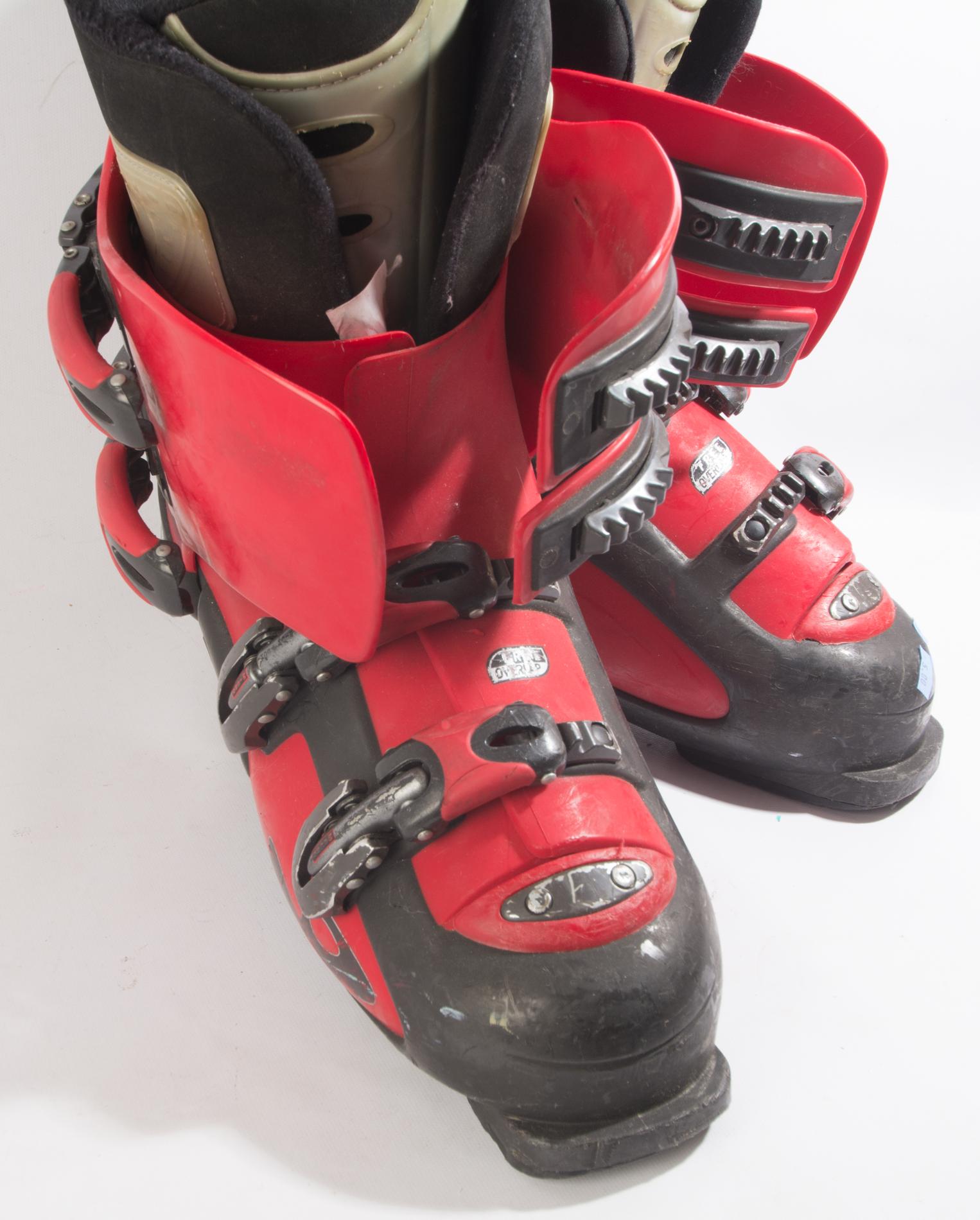 Three Pairs of Ski Boots featuring Rossignol