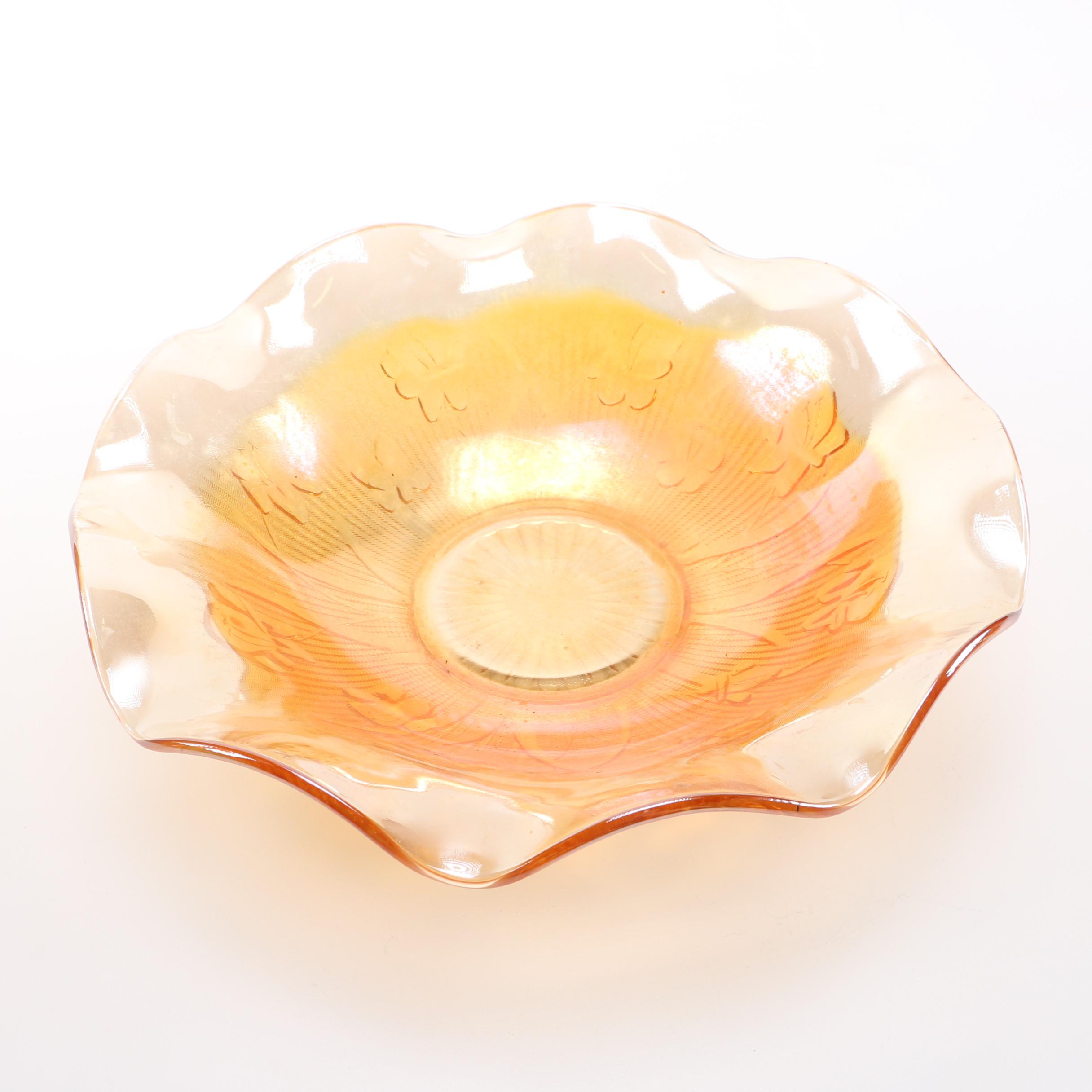 amber glass vase, tray, and candle holders