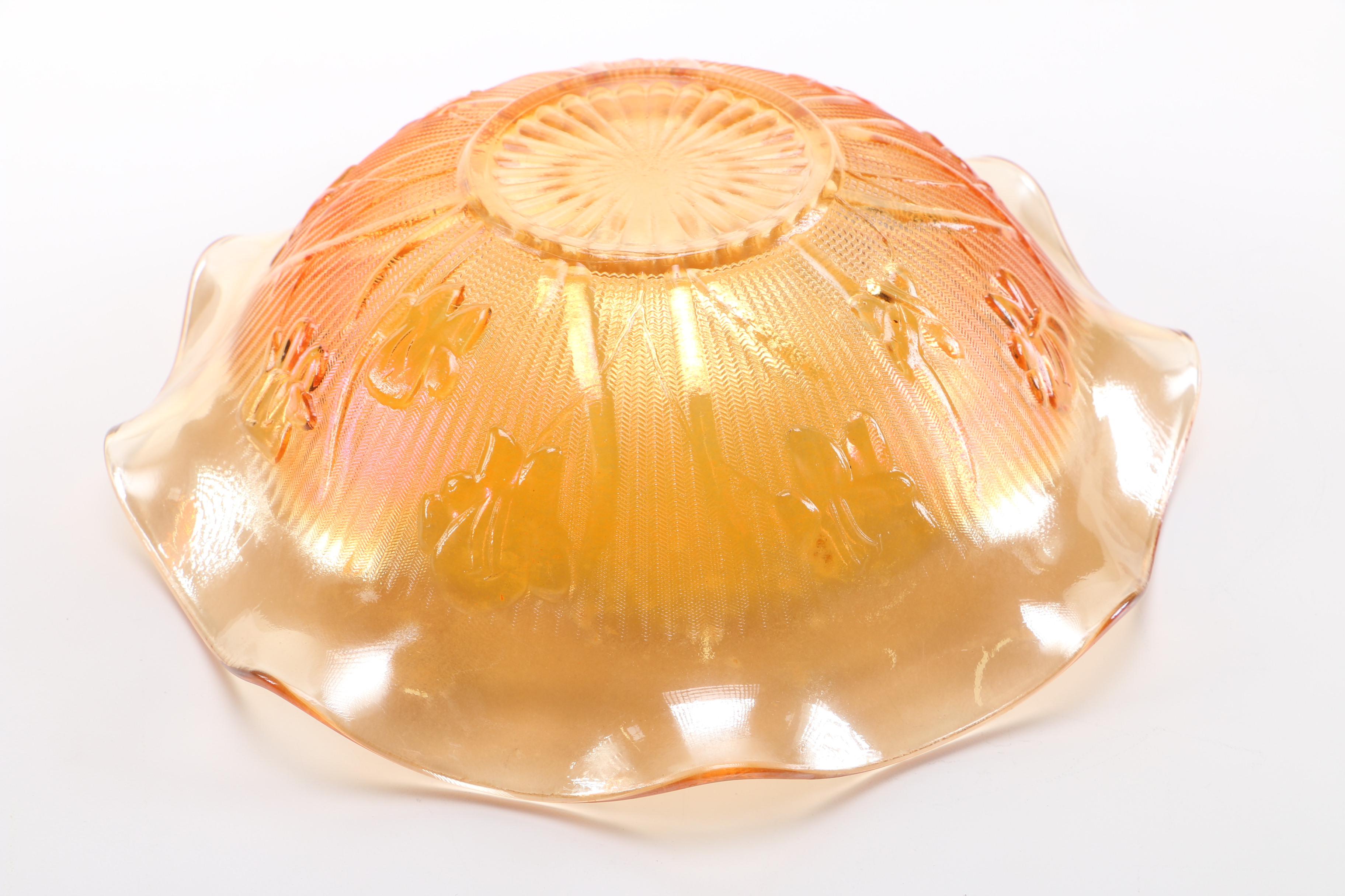 amber glass vase, tray, and candle holders