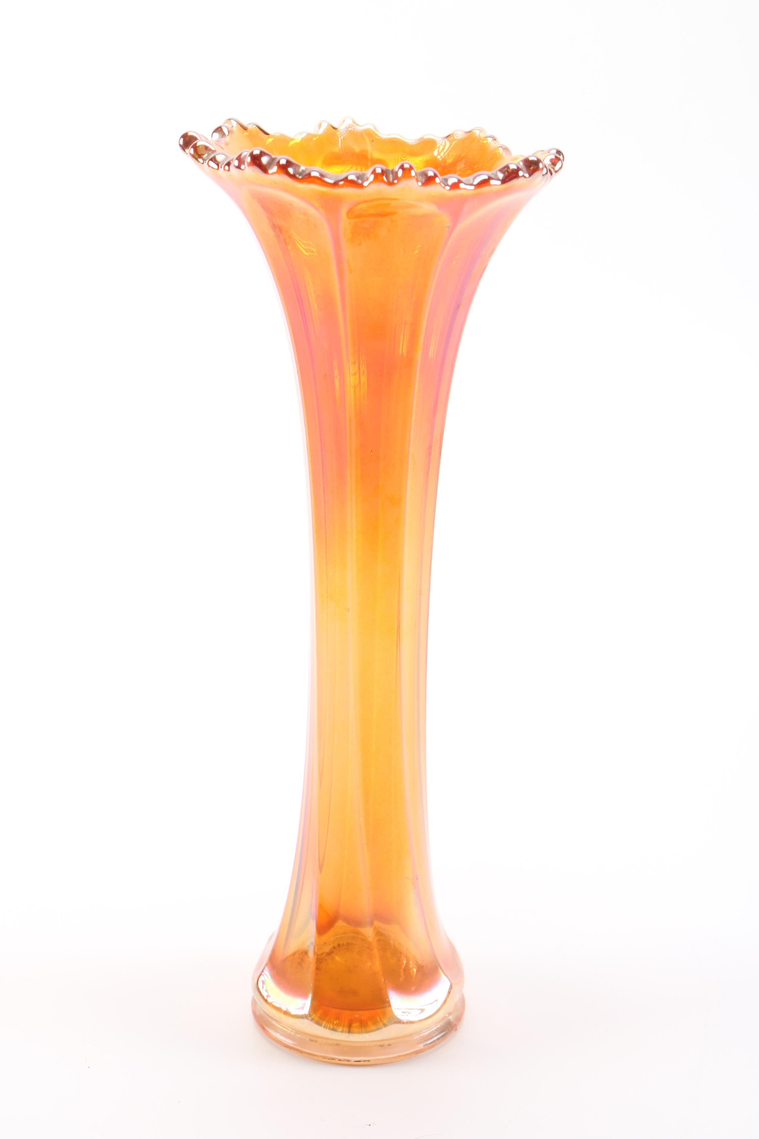 amber glass vase, tray, and candle holders