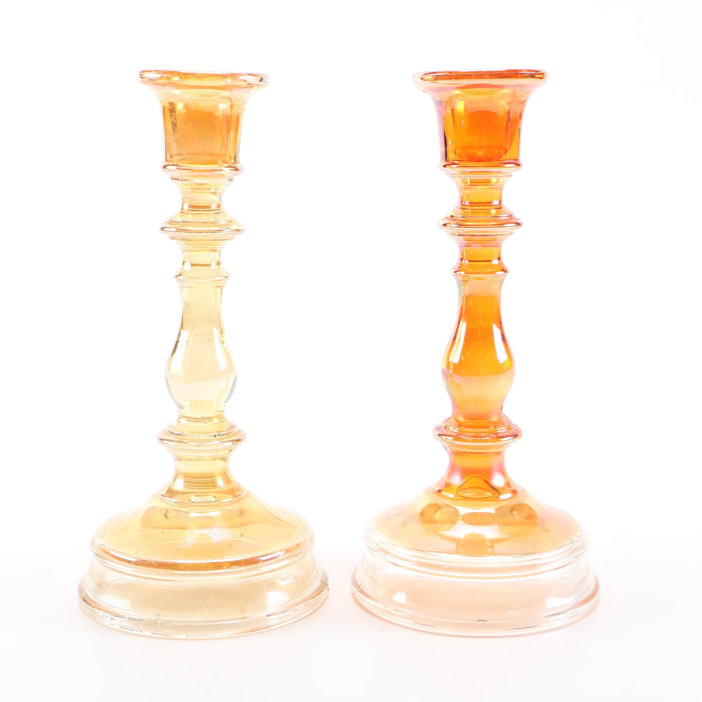 amber glass vase, tray, and candle holders