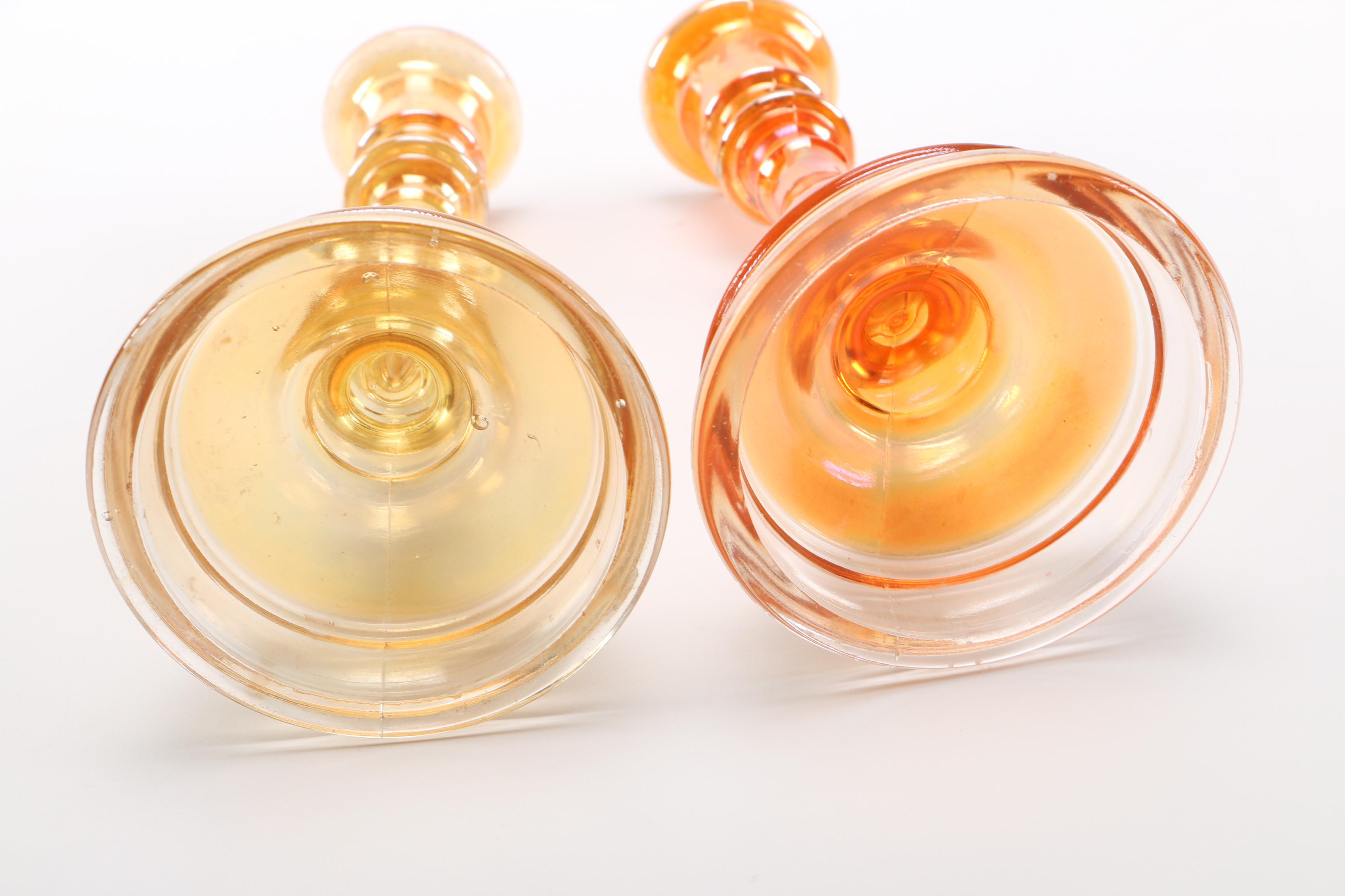 amber glass vase, tray, and candle holders