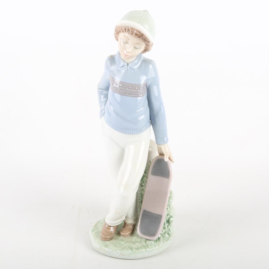 Nao by Lladro Boy With Skateboard Figurine