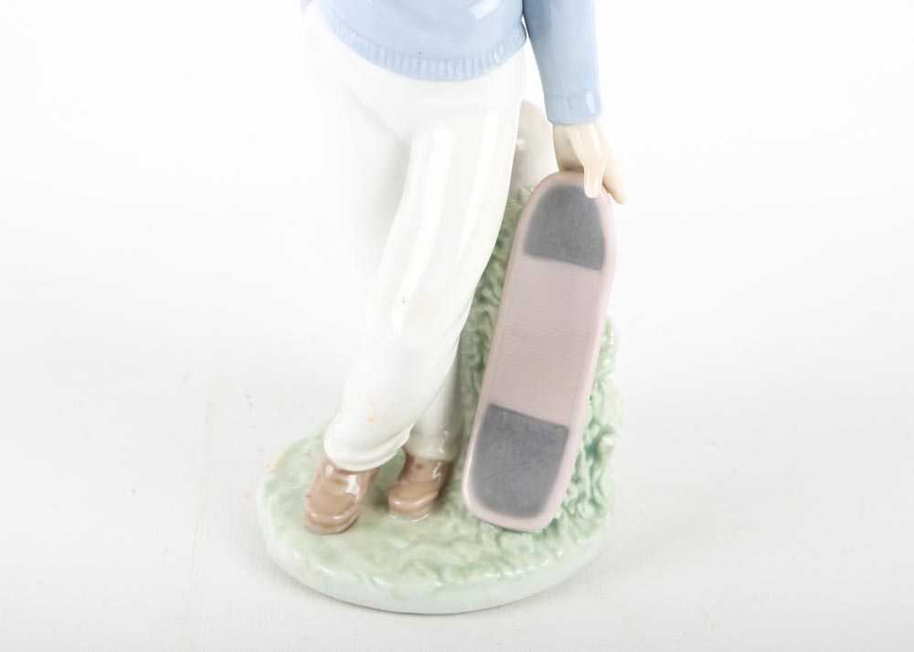 Nao by Lladro Boy With Skateboard Figurine