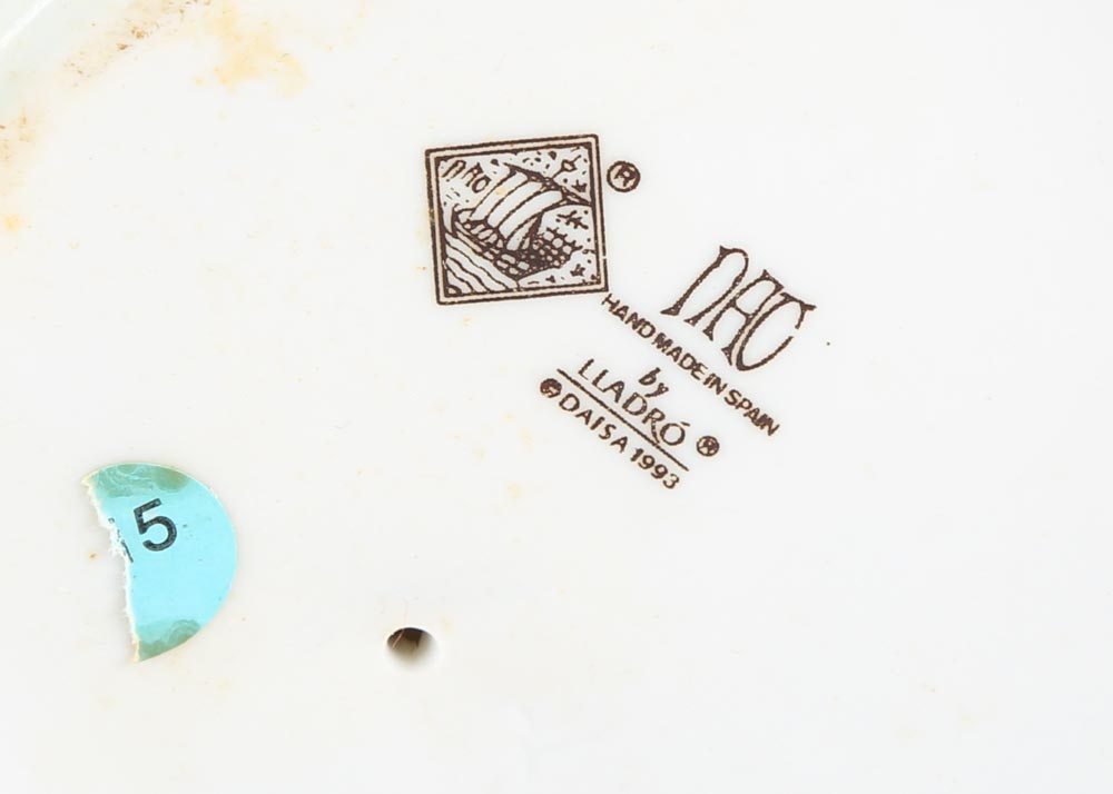 Nao by Lladro Boy With Skateboard Figurine