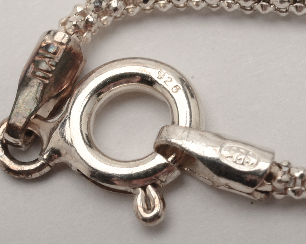 Assortment of Ten Sterling Silver Chains