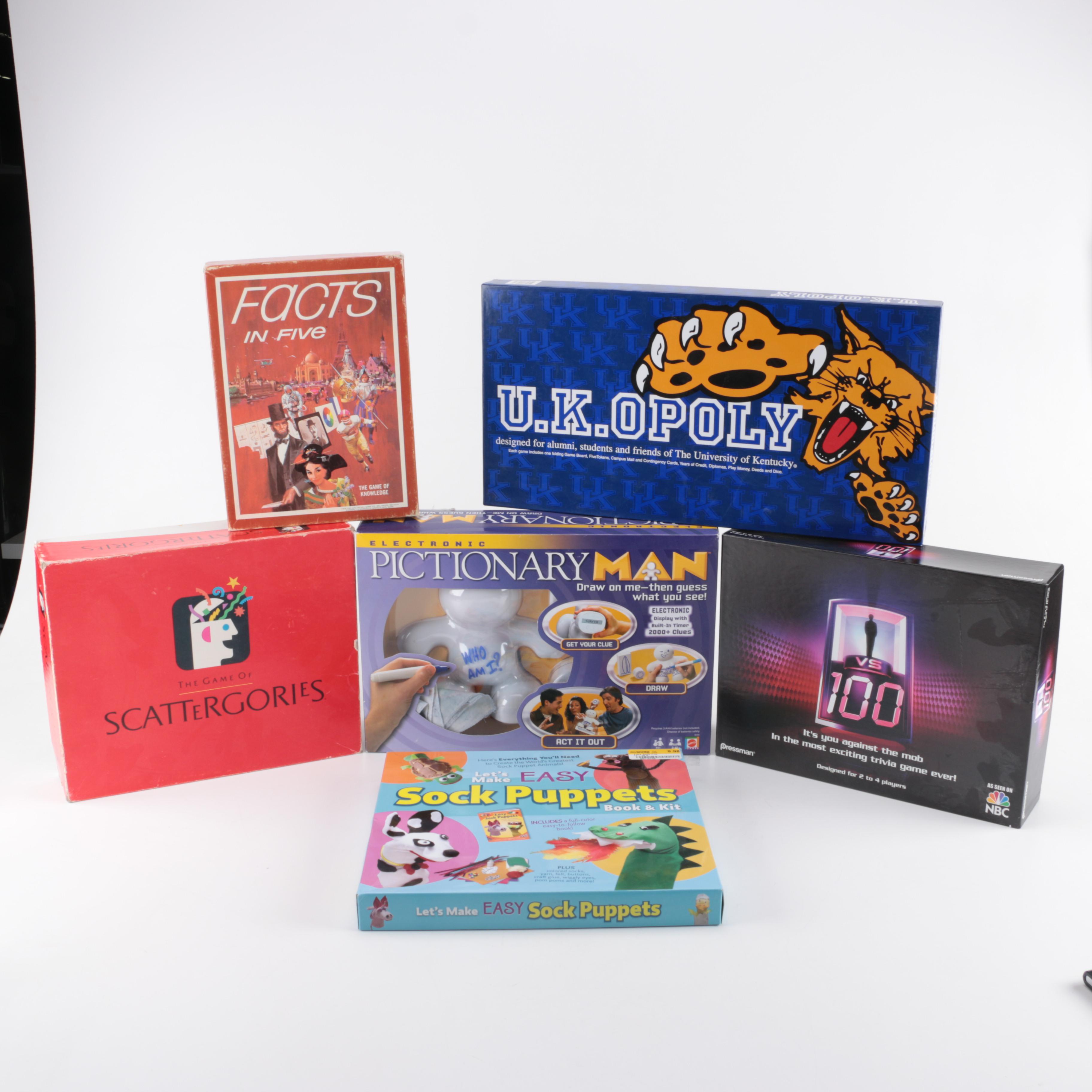 Assortment of Board Games and Sock Puppet Set