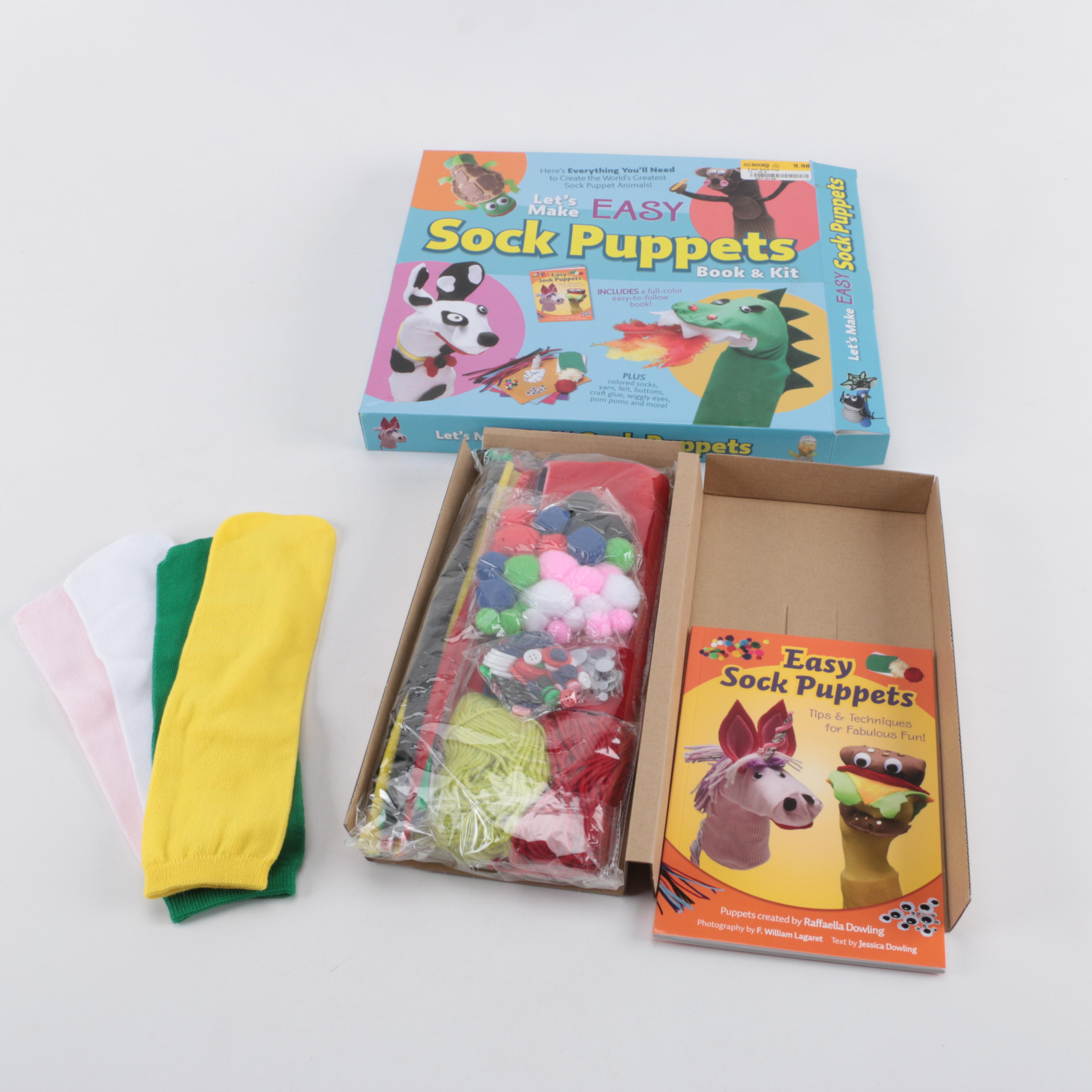Assortment of Board Games and Sock Puppet Set