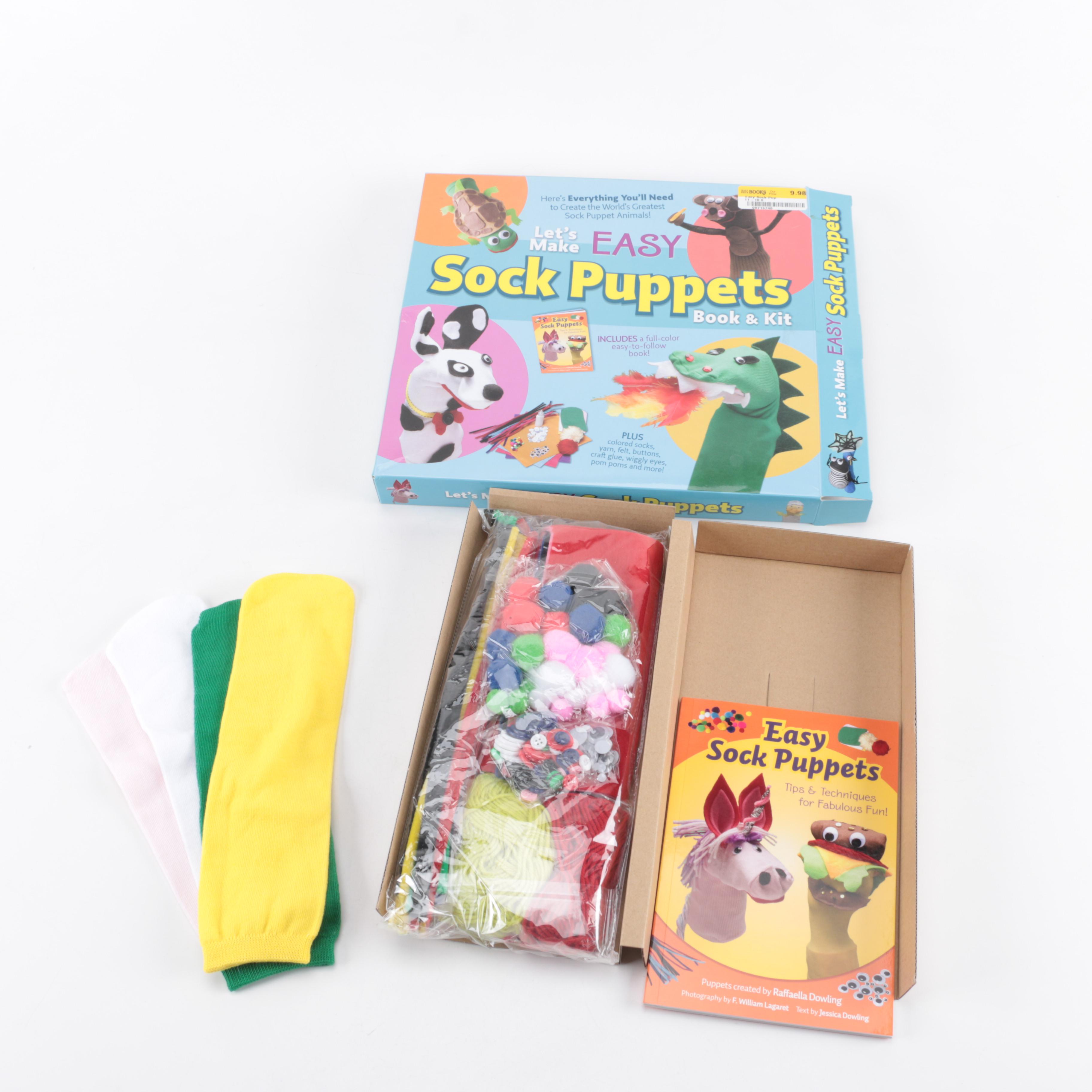 Assortment of Board Games and Sock Puppet Set
