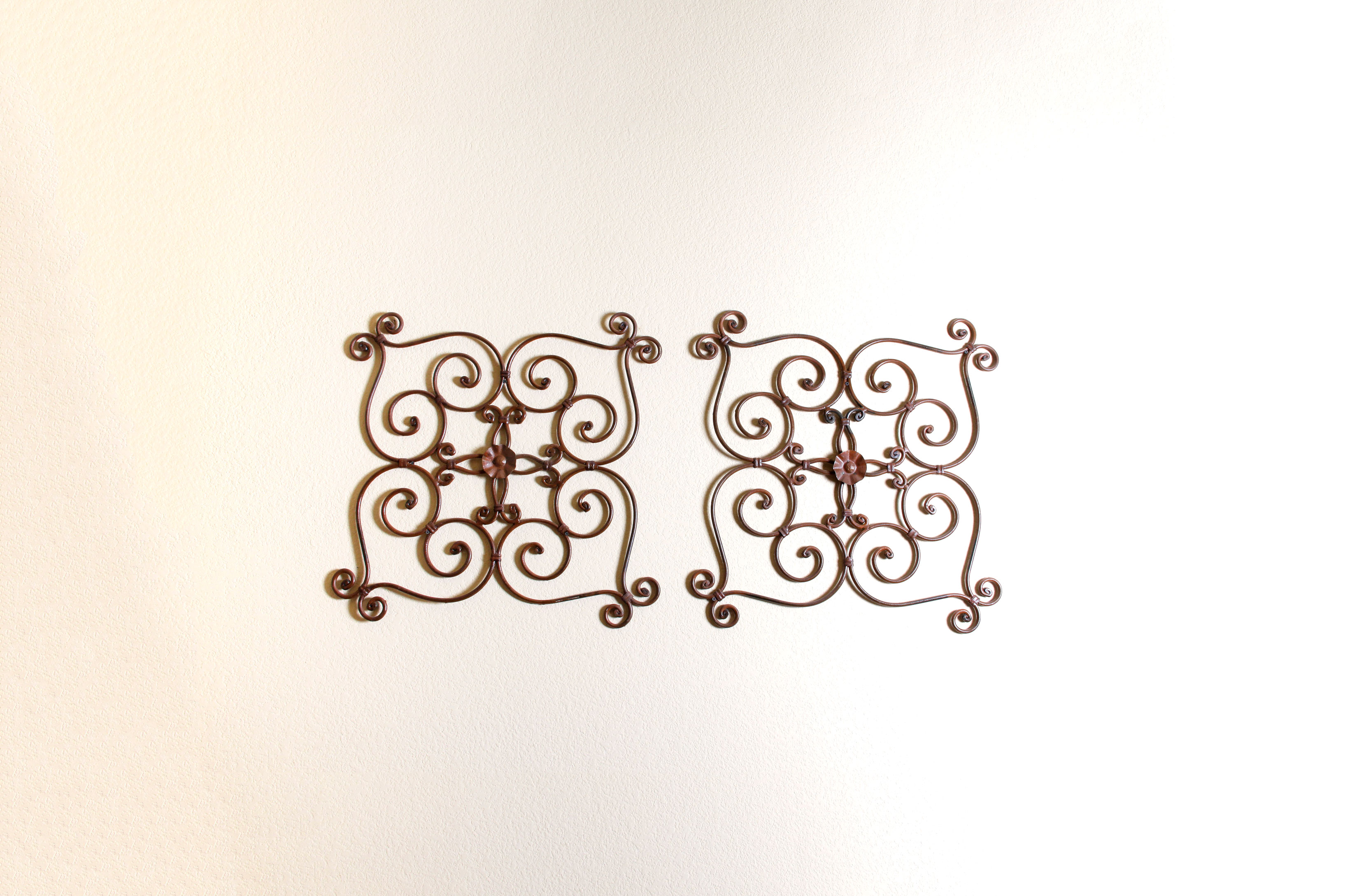 Pair of Wrought Metal Wall Hangings