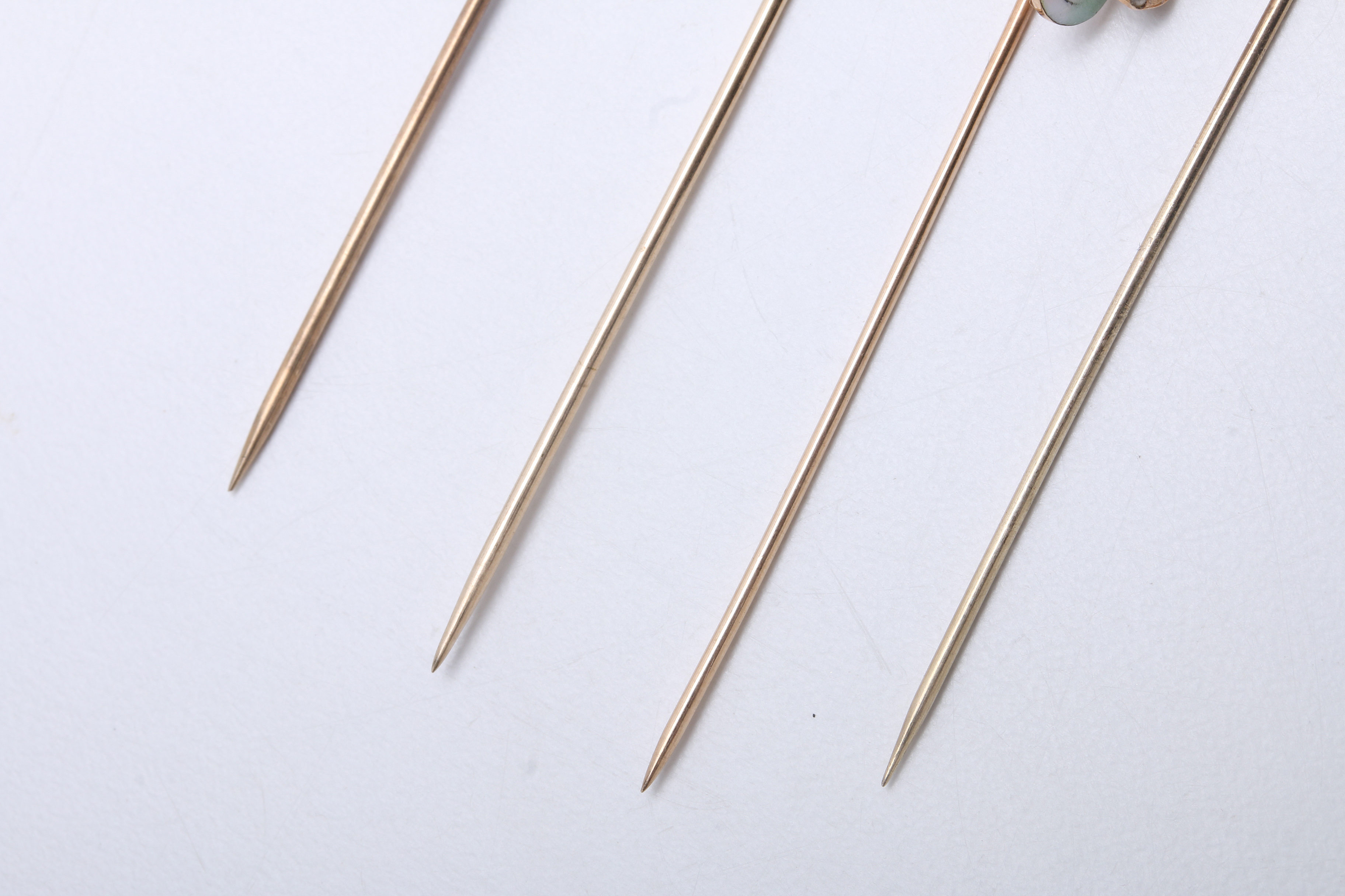 Four Antique 10K Yellow Gold Stick Pins with Stones and Diamonds