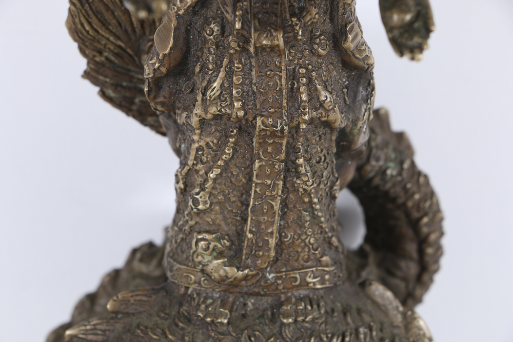 Brass Figure With a Dragon