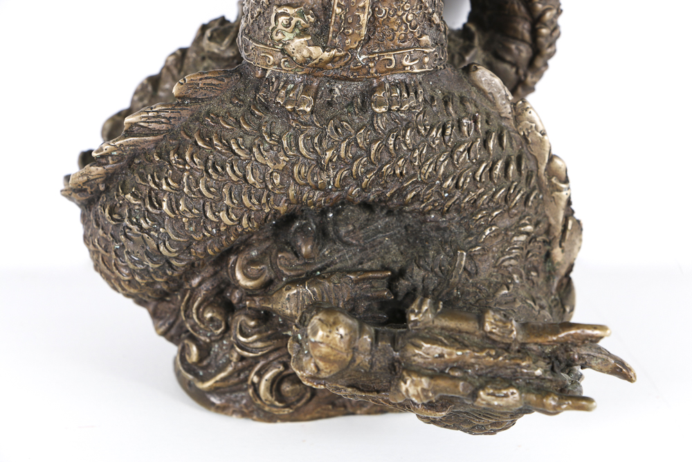 Brass Figure With a Dragon