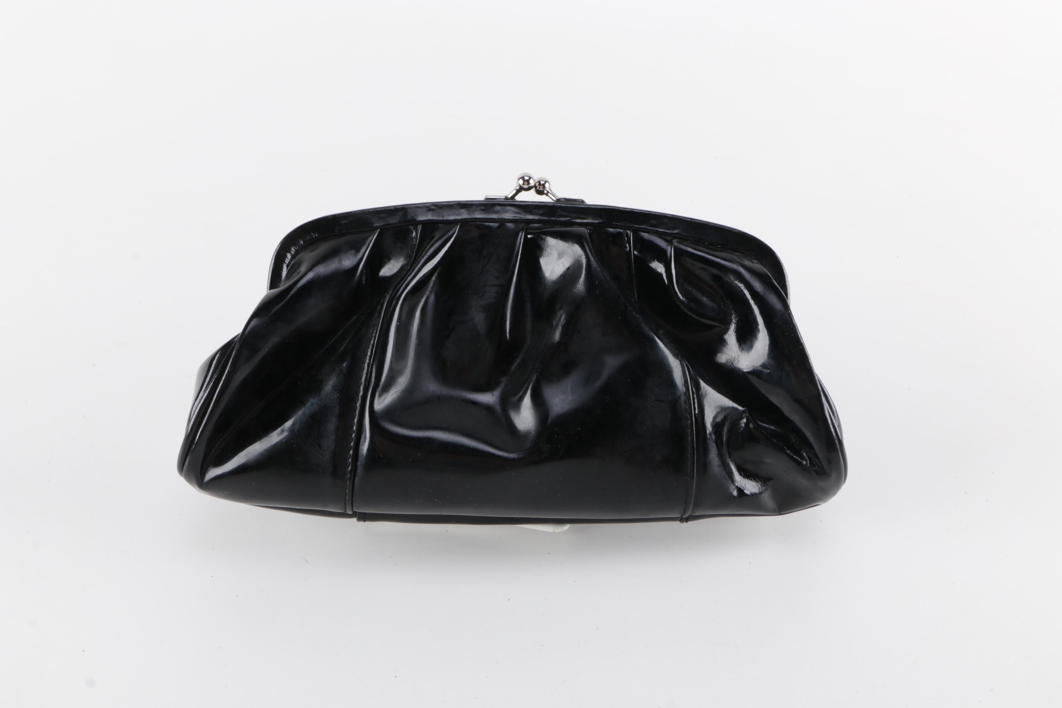 Pair of Solas Patent Leather Clutch Bags with light inside