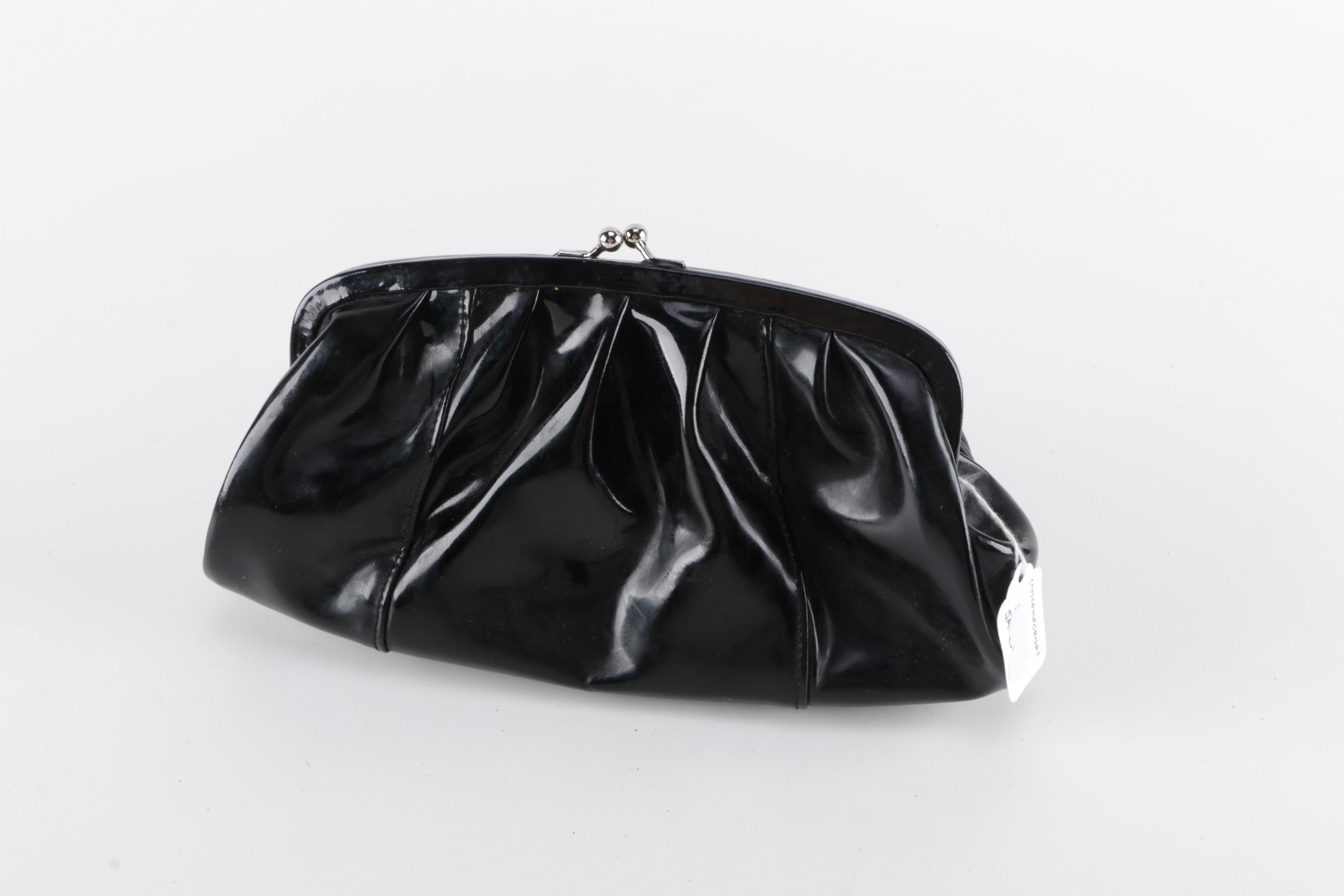 Pair of Solas Patent Leather Clutch Bags with light inside