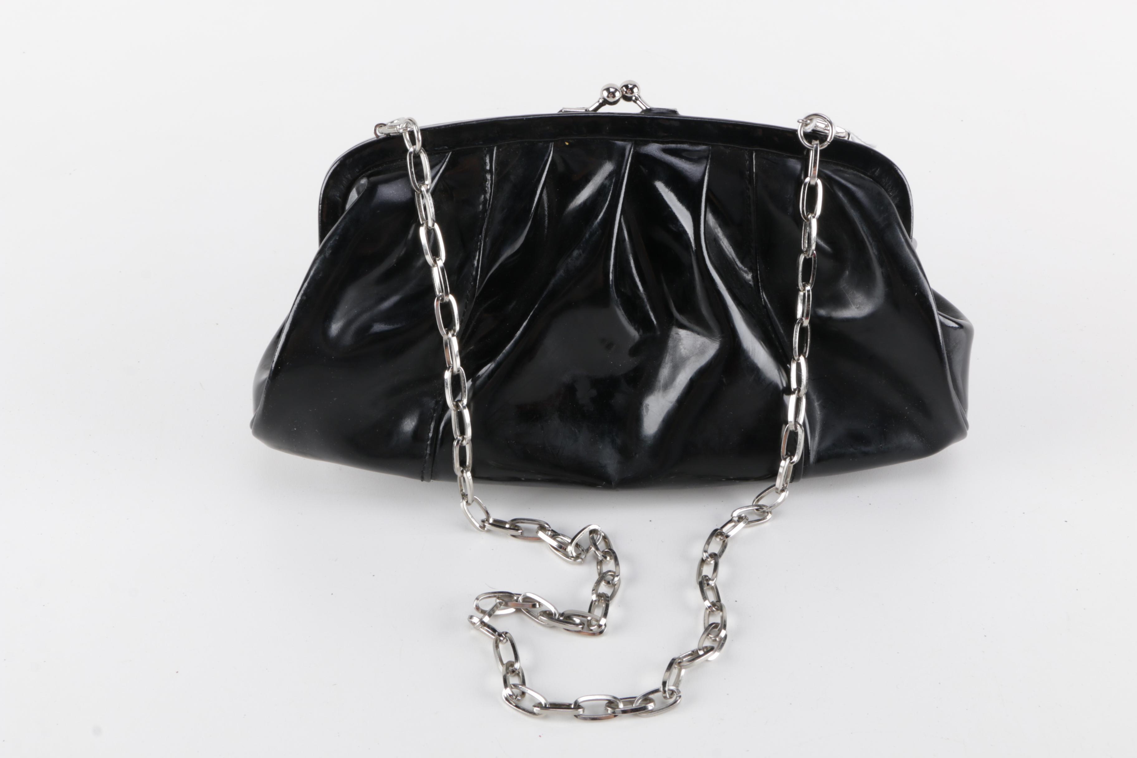 Pair of Solas Patent Leather Clutch Bags with light inside