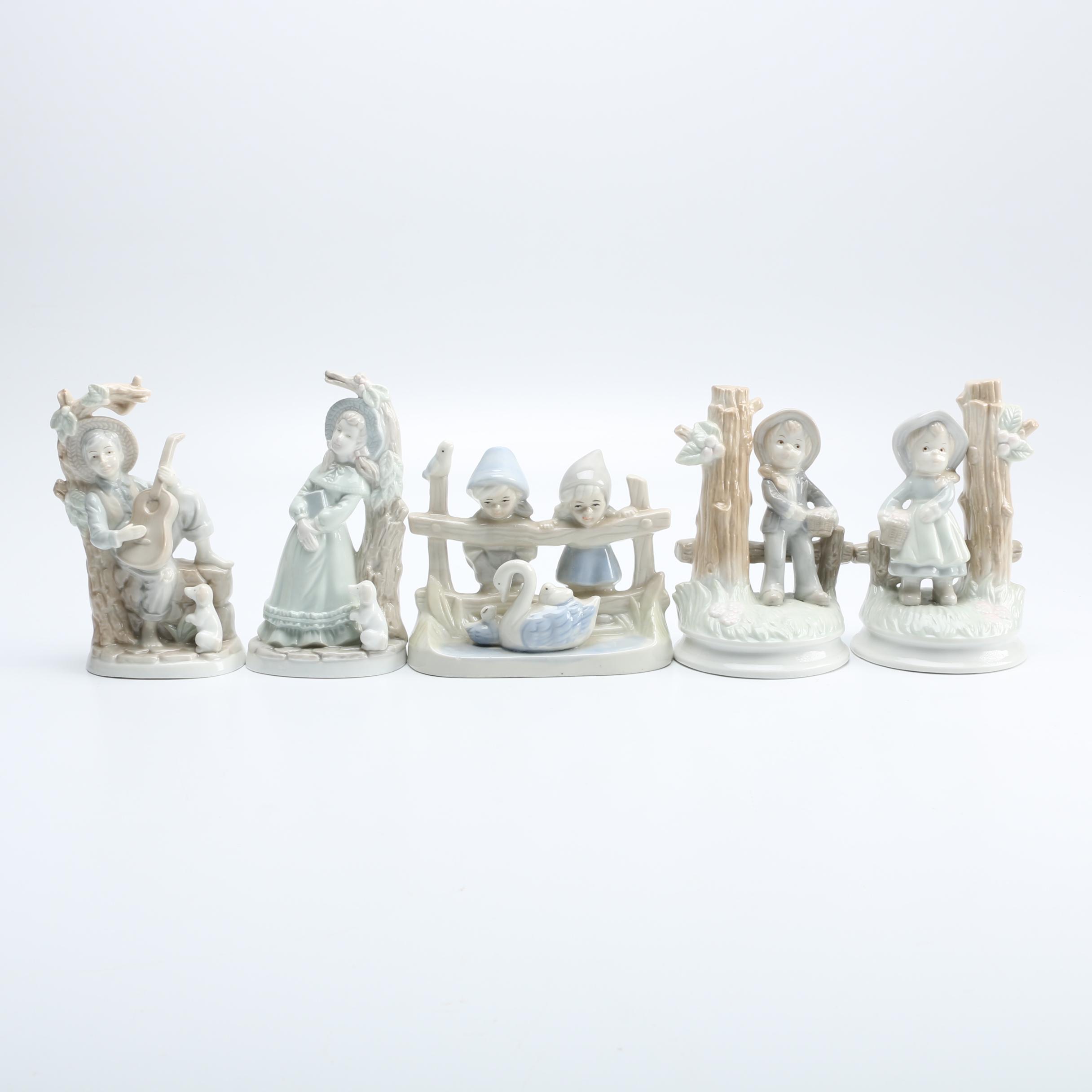 Group of Porcelain Figurines of Children