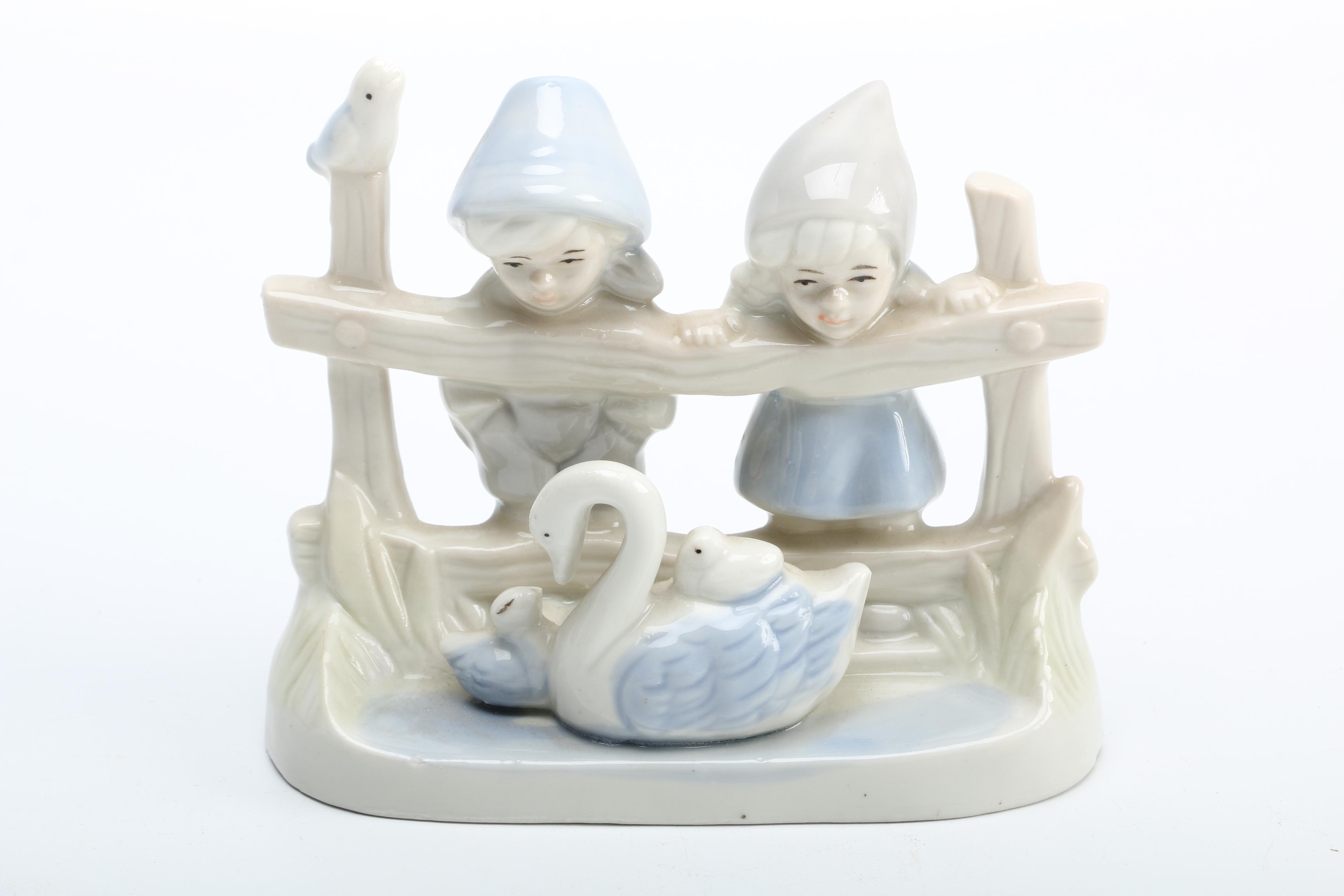 Group of Porcelain Figurines of Children