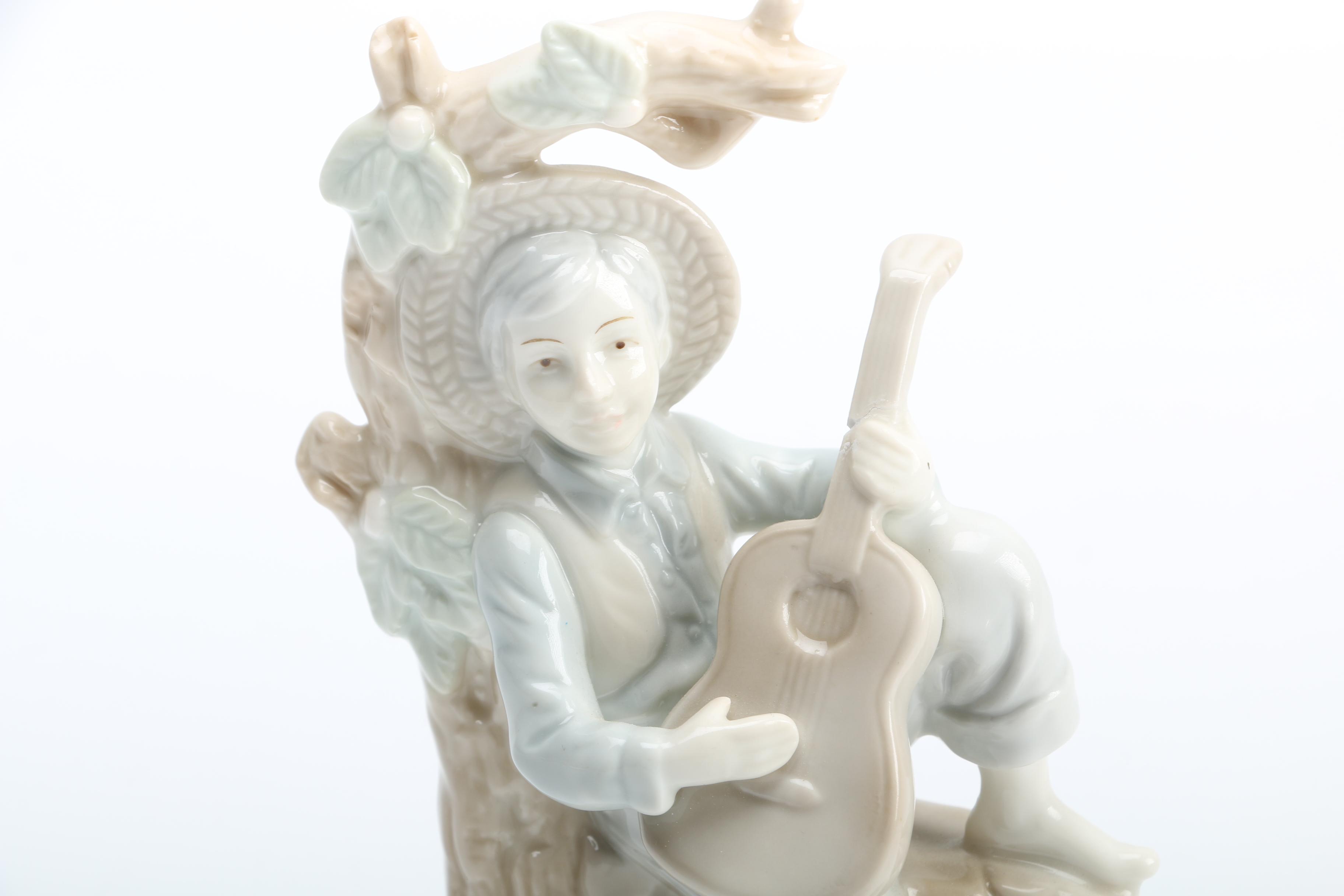 Group of Porcelain Figurines of Children