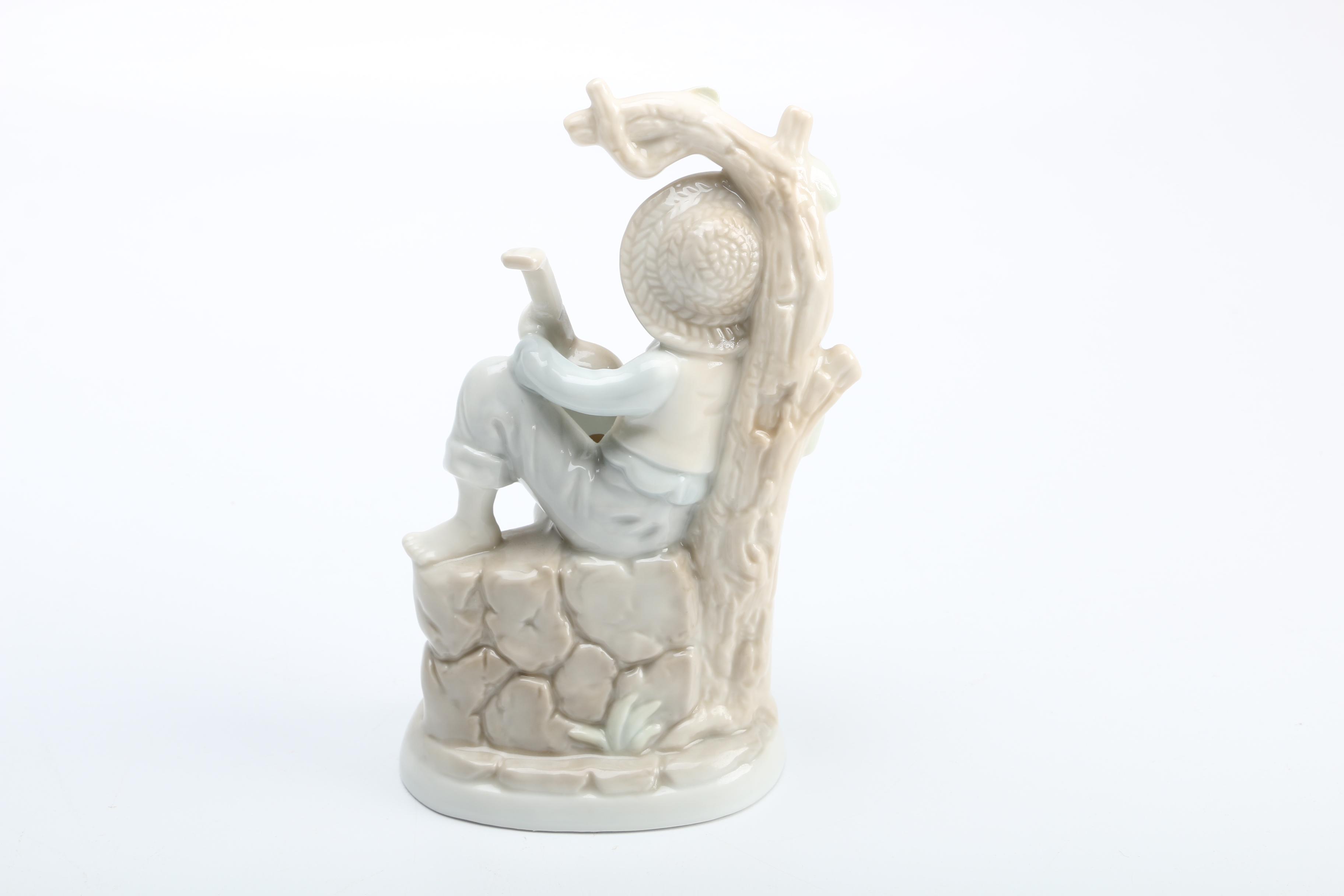 Group of Porcelain Figurines of Children