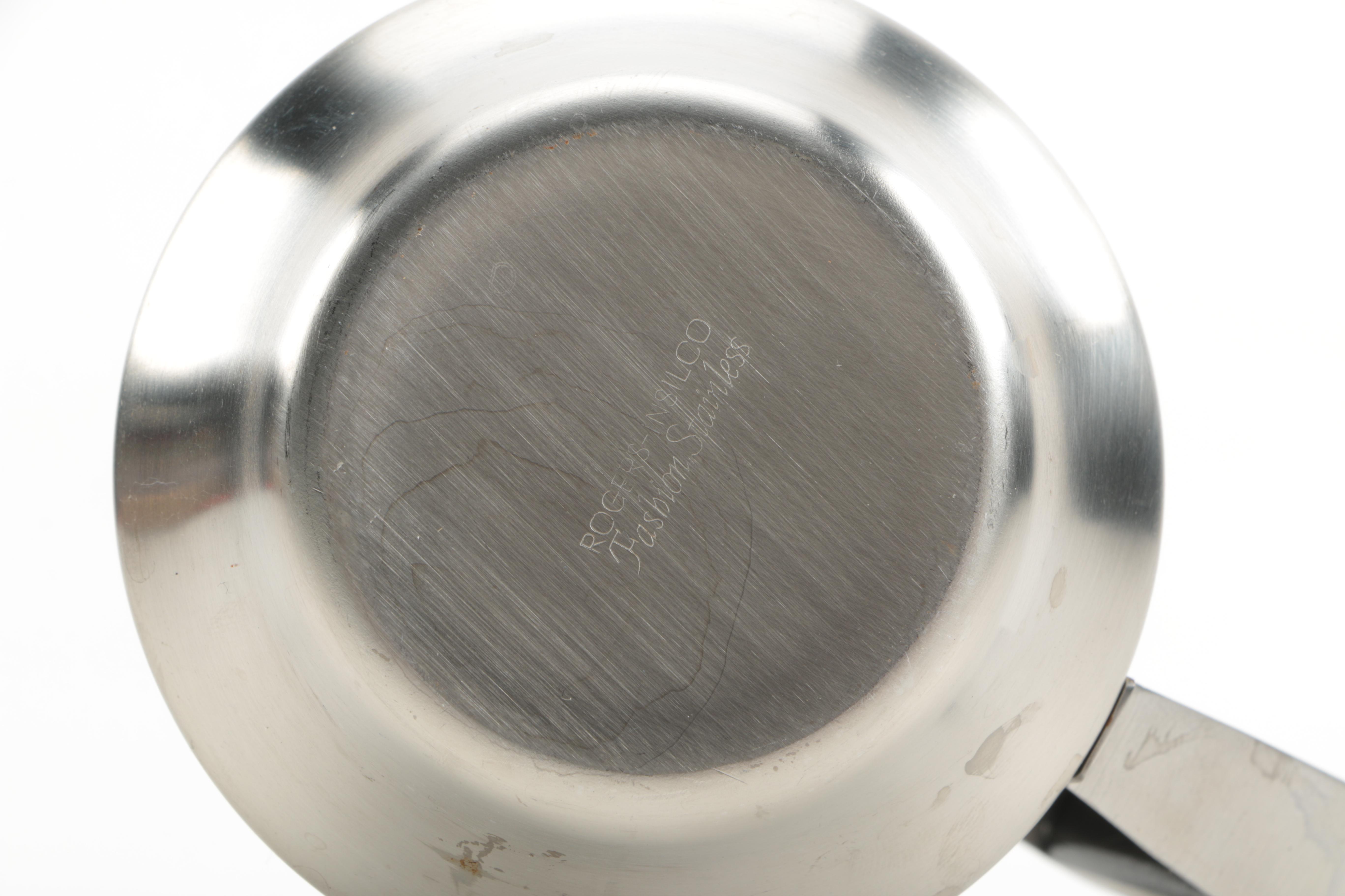 Stainless Steel Serving Pieces and Metal Spoon Rest