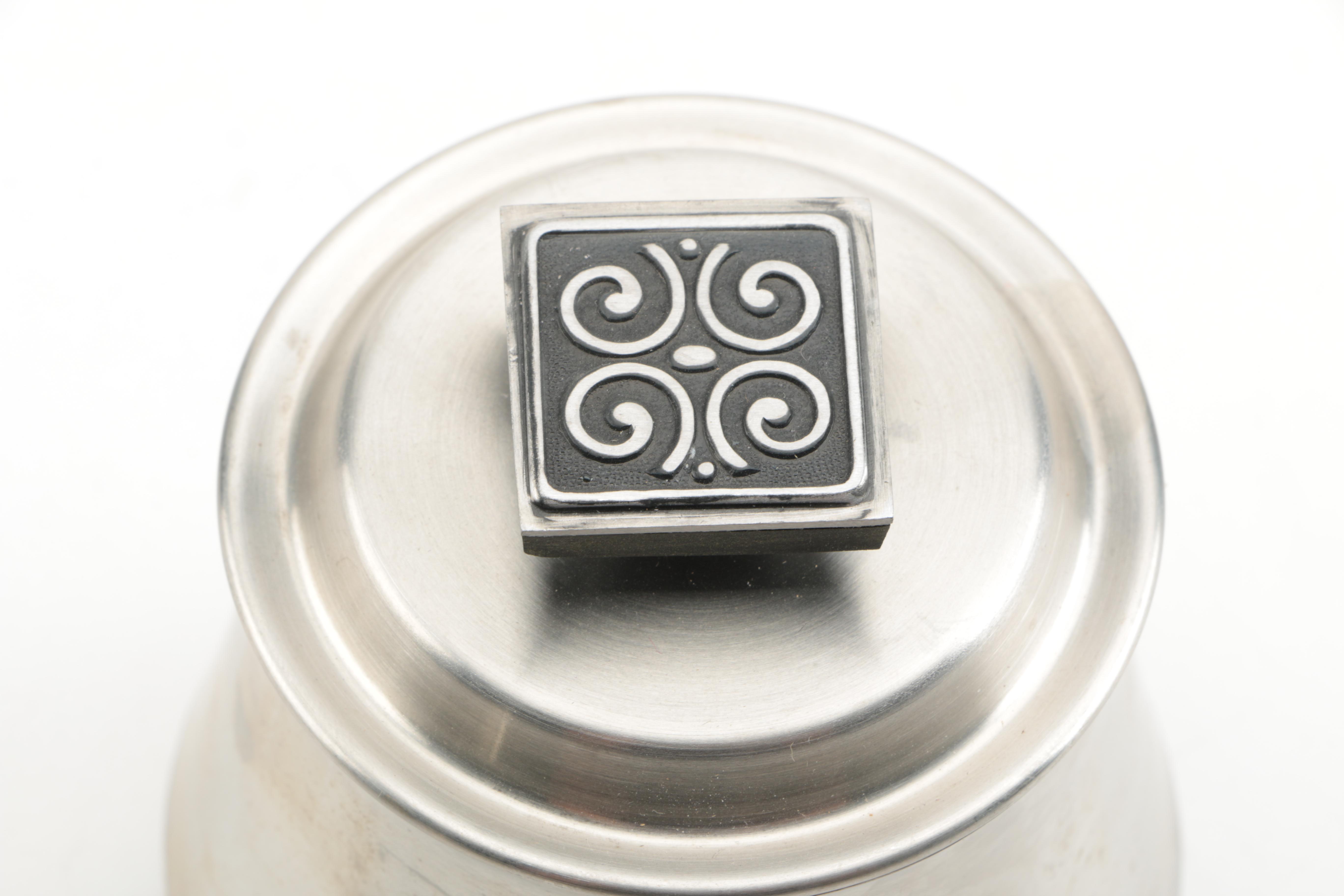 Stainless Steel Serving Pieces and Metal Spoon Rest