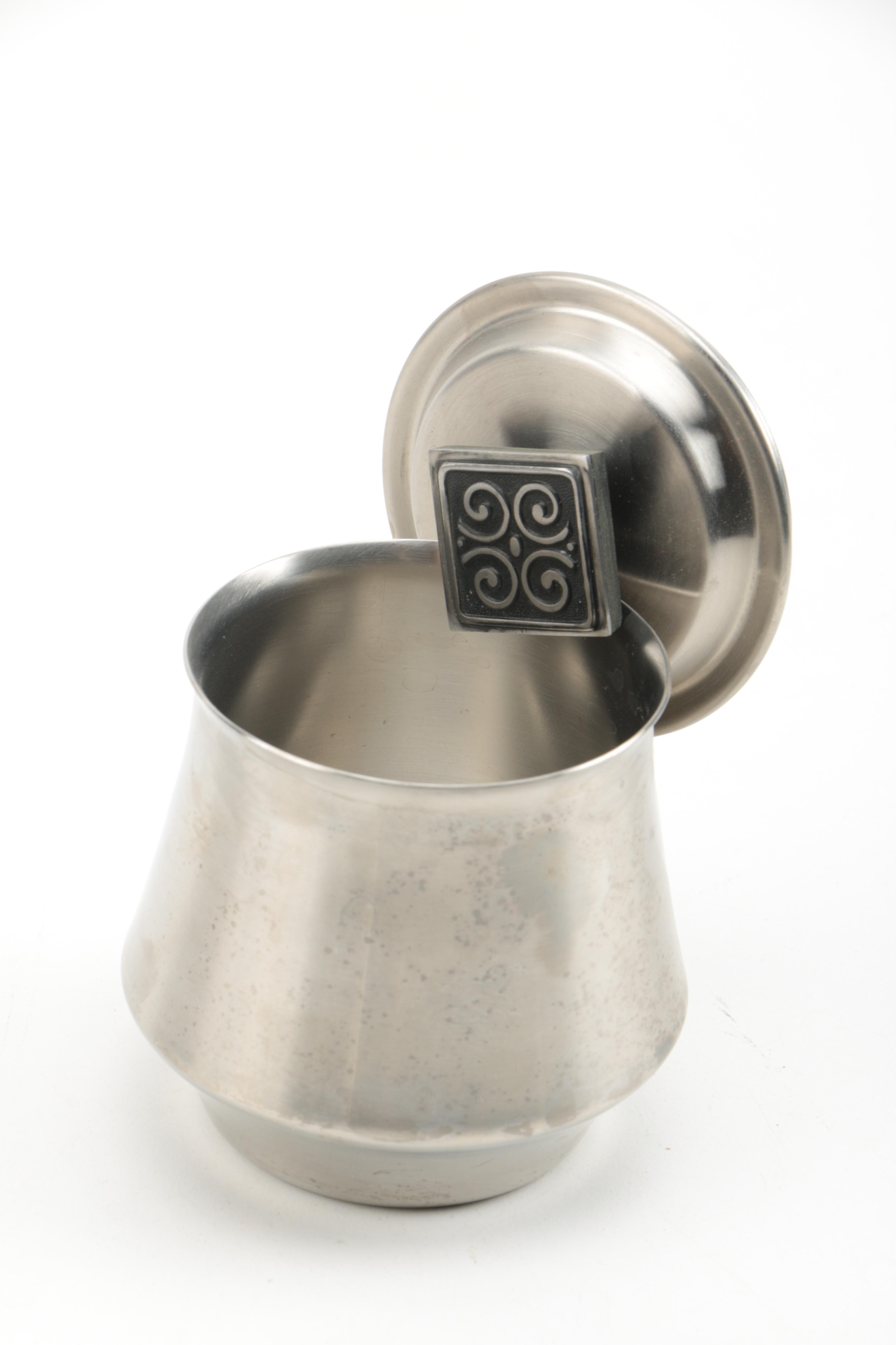 Stainless Steel Serving Pieces and Metal Spoon Rest