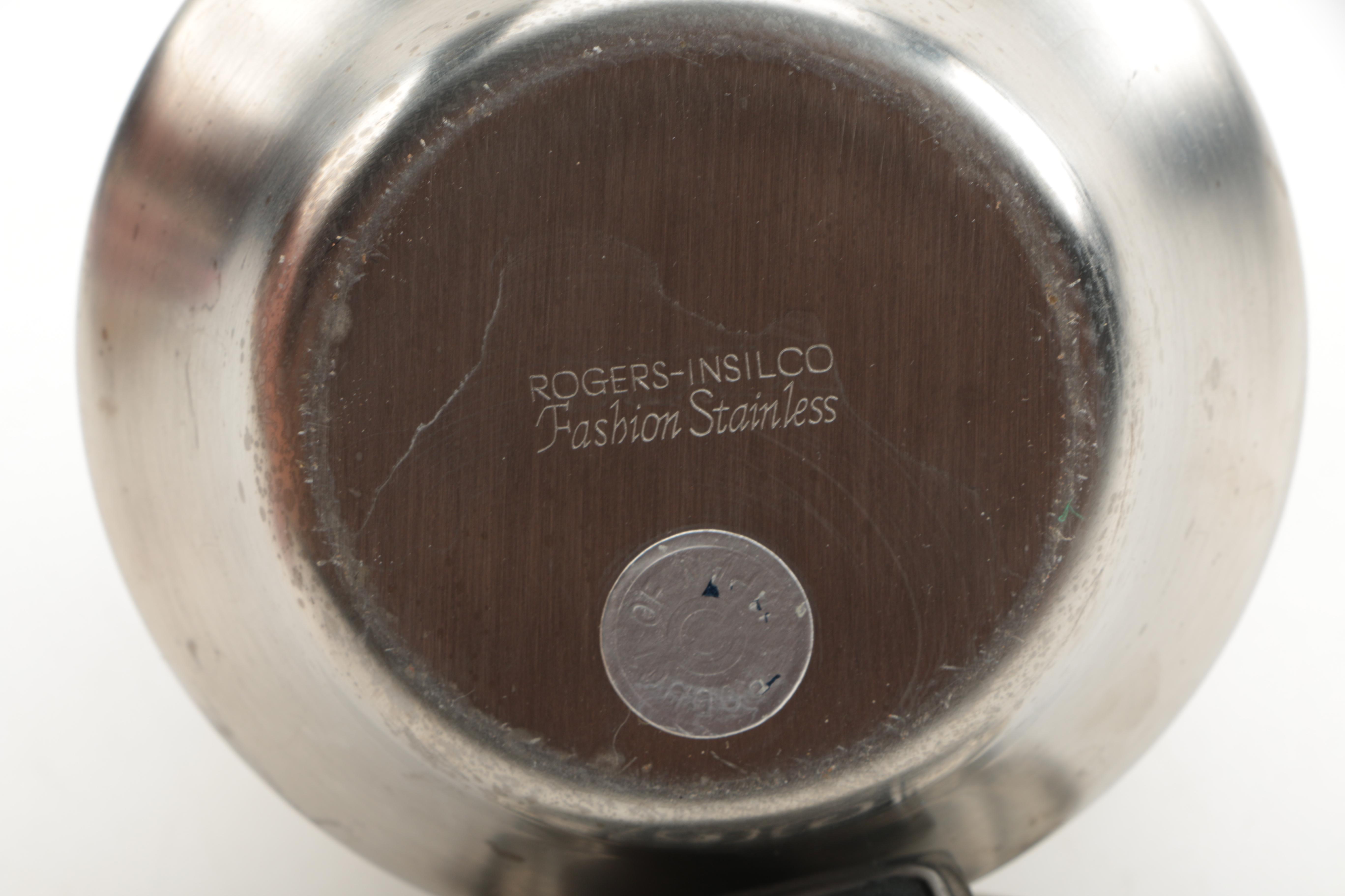 Stainless Steel Serving Pieces and Metal Spoon Rest