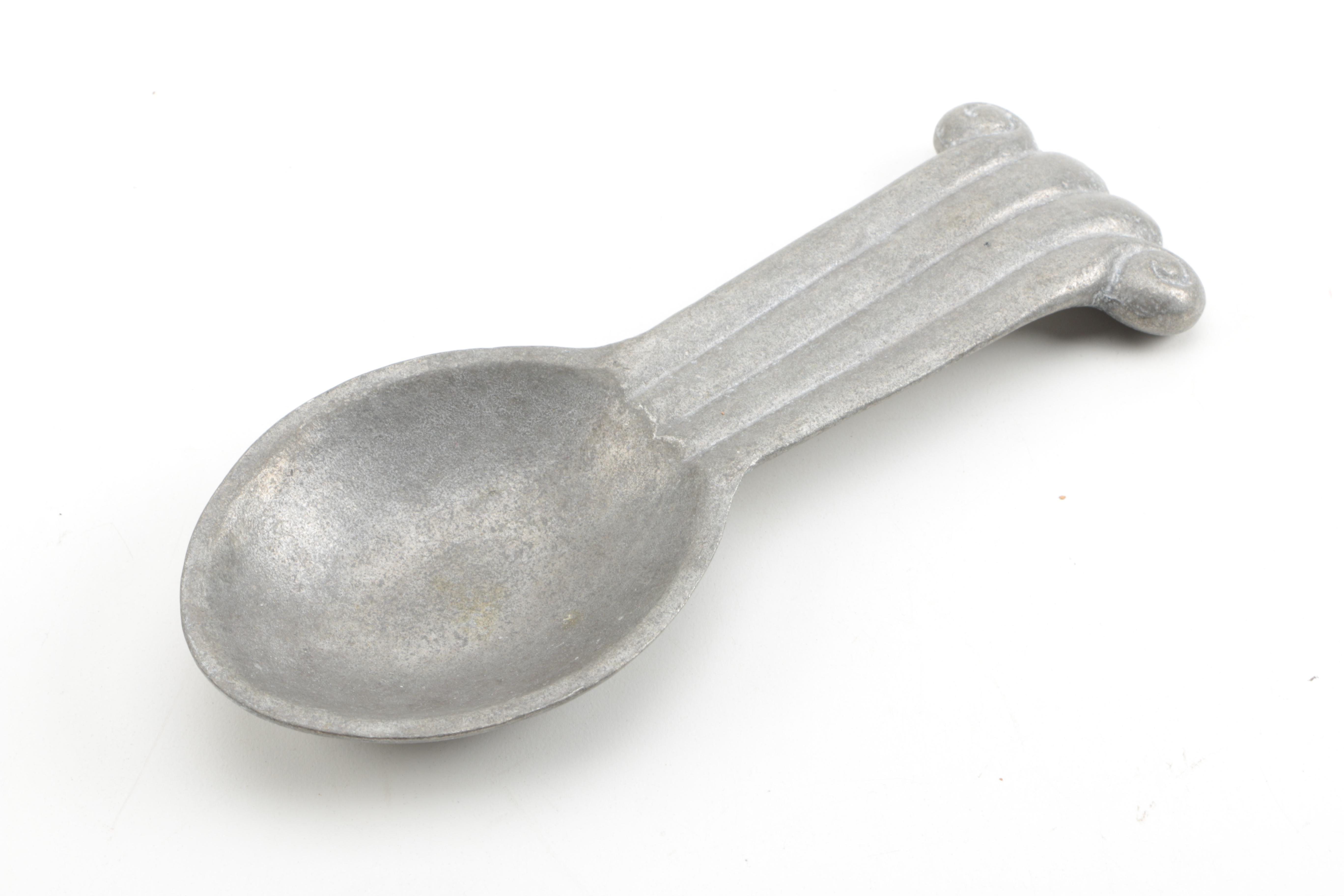 Stainless Steel Serving Pieces and Metal Spoon Rest