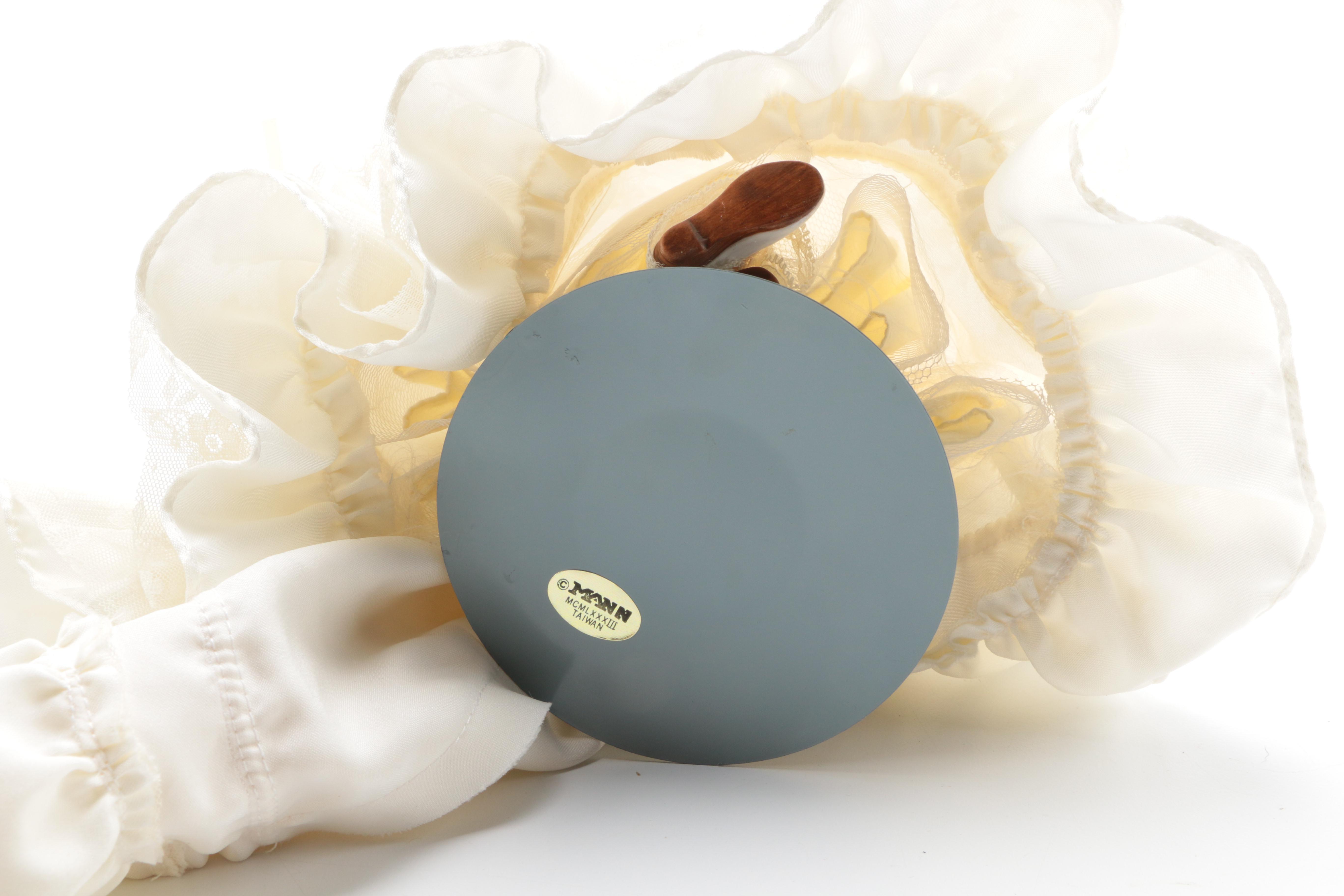 Pair of Porcelain Dolls